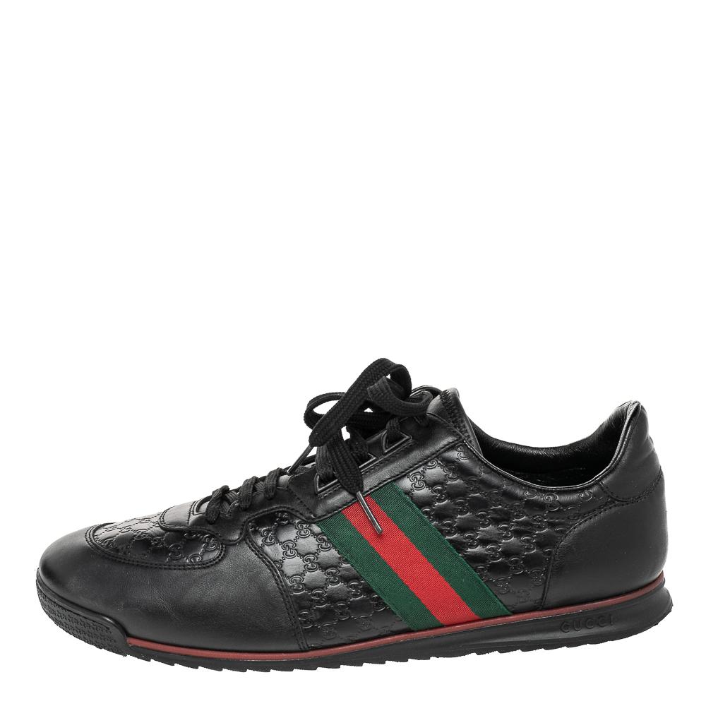 Bring home the luxurious high-fashion touch with these sneakers from Gucci. Crafted from Guccissima leather, these black sneakers come flaunting suave details like the web stripes, the lace-up and the GG on the counters. You wouldn't want to miss
