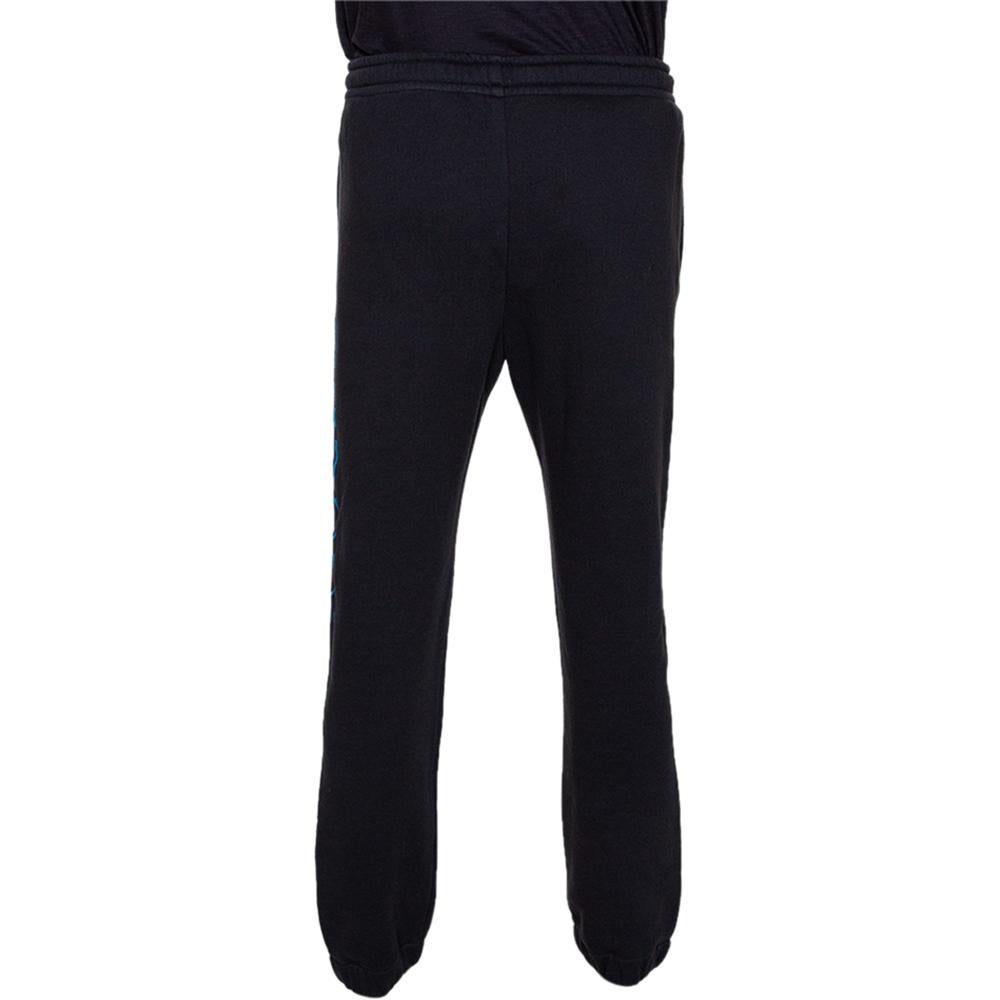 To give you comfort and high style, Gucci brings you this creation that has been made from cotton and designed with a vertical logo print on the side, drawstring waistband and two pockets. This pair of black track pants will surely be a delighting