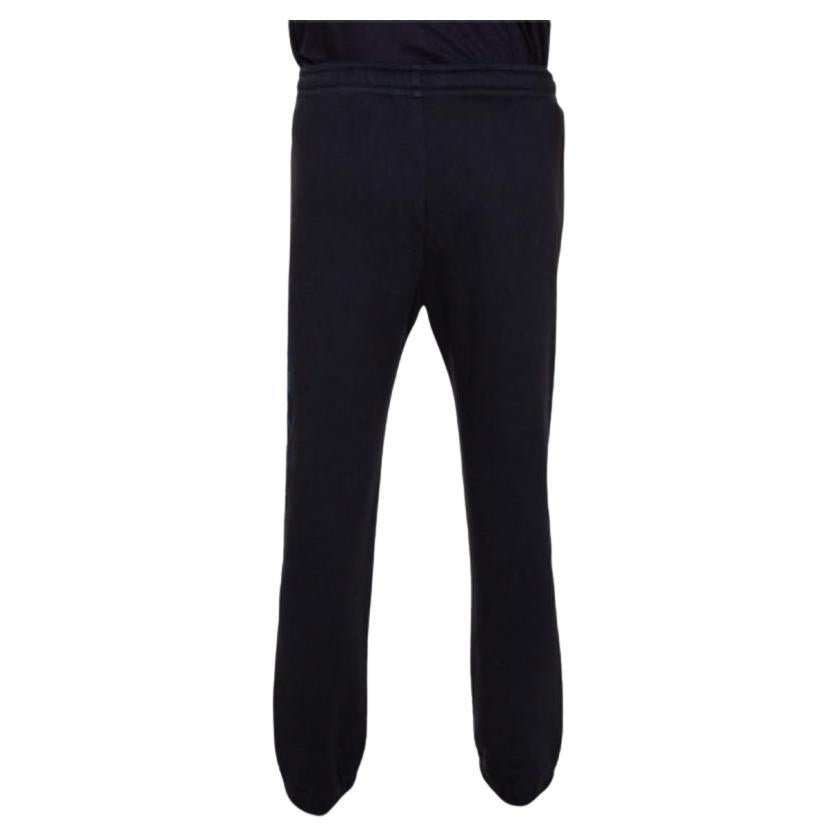 Schwarze Gucci-Strick-Traghose mit kontrastierendem vertikalem Logodruck und Logodruck M im Angebot