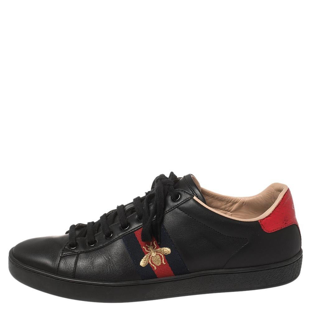 Stacked with signature details, this Gucci pair is rendered in leather and designed in a low-cut style with lace-up vamps. They have been fashioned with the bee motif on the Web trim and python-embossed panels on the counters.

Includes: Original