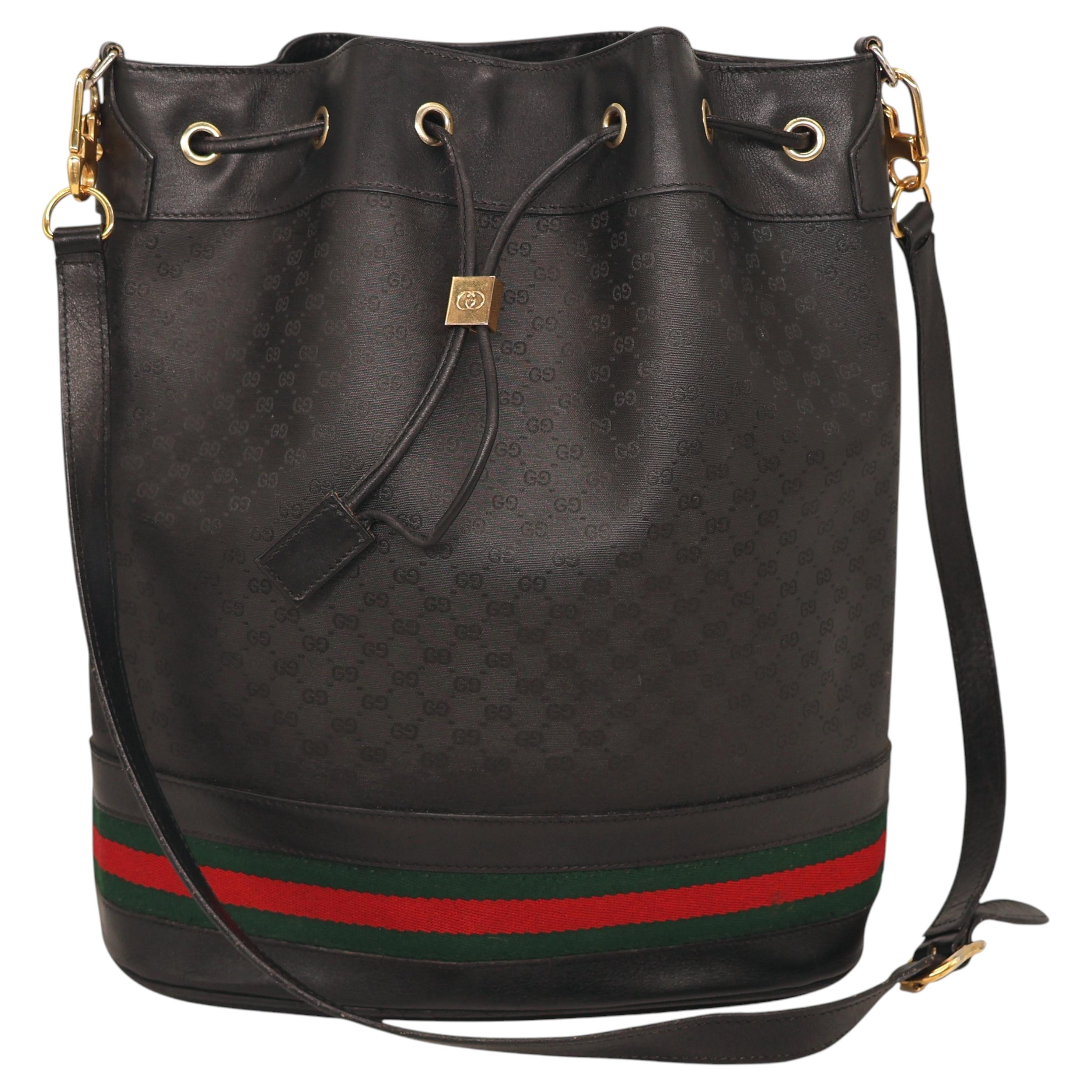 Bolso Gucci de piel negra y lona Micro Guccissima Drawstring Sherry Line, 1980