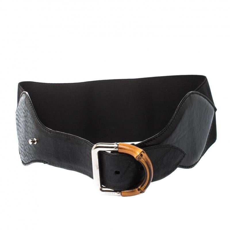 This belt has a well-established Gucci mark. Made from black leather and elastic fabric, this waist belt features bamboo-inspired buckle fastening.

Includes: The Luxury Closet Packaging


