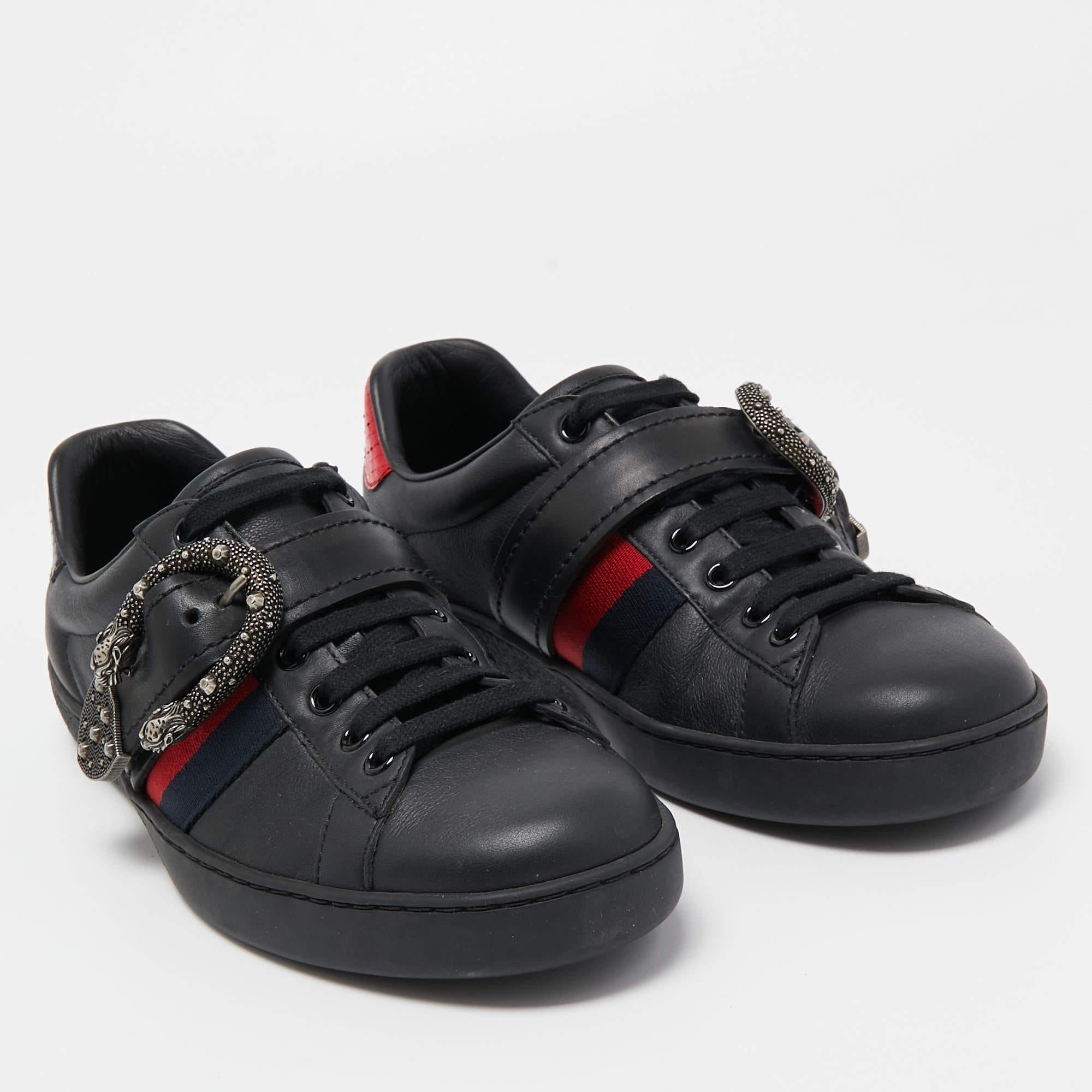 Stacked with signature details, this Gucci pair is rendered in leather and is designed in a low-cut style with lace-up vamps. They have been fashioned with the iconic web stripes and Dionysus buckles. Complete with trims carrying the brand label on