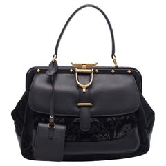 Gucci Borsa Lady Stirrup in pelle nera e camoscio con manico superiore