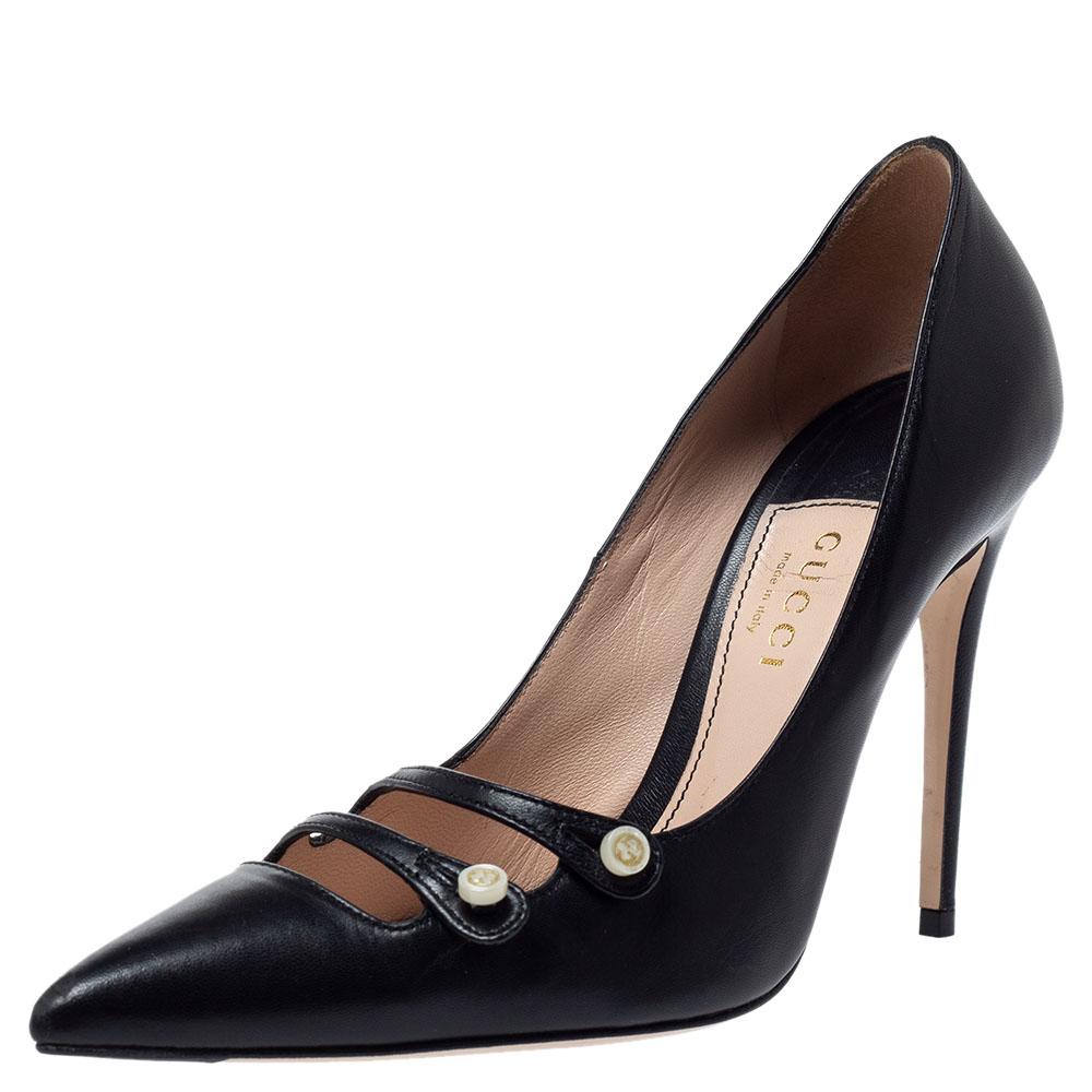 The iconic fashion house of Gucci brings to you this stunning pair of Aneta pumps perfect for both day and evening use. Crafted in striking black leather, these pointed-toe pumps feature two buttoned straps at the vamps along with a sleek design and