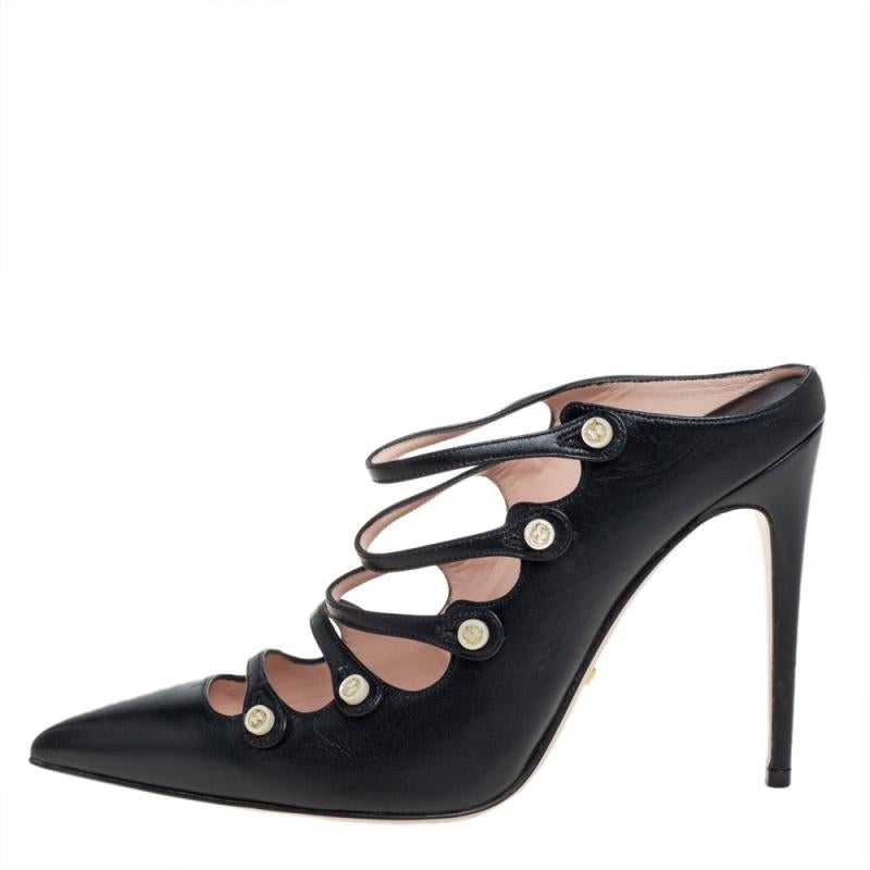 The fashion house of Gucci brings you this stunning pair of Aneta mules that is perfect for both day and evening use. Crafted in black leather, these pointed-toe mules feature multiple buttoned straps at the vamps and are lifted on slim