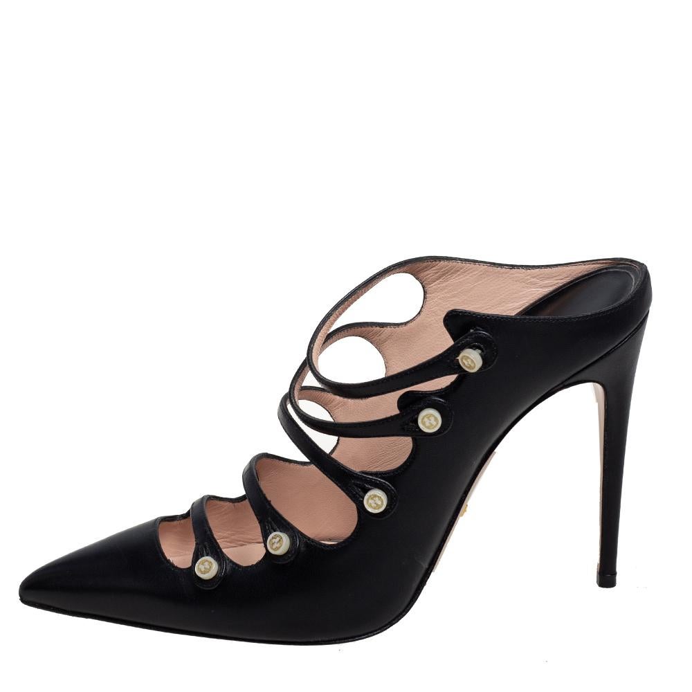 The fashion house of Gucci brings to you these stunning pair of Aneta pumps that are perfect for both day and evening use. Crafted in black leather, these pointed-toe pumps feature buttoned straps at the vamps along with a sleek design and high