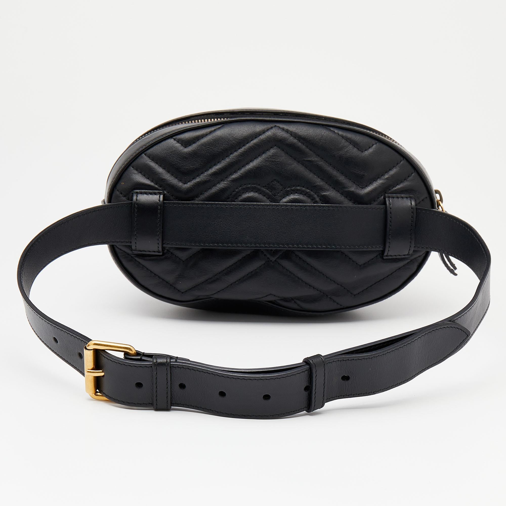The GG Marmont belt bag was released in the brand's Pre-Fall 2017 collection, and it went on to be a hit! This one here in matelassé leather is equipped with a zipper fastening that opens to a well-sized suede interior. On the front, there is a GG