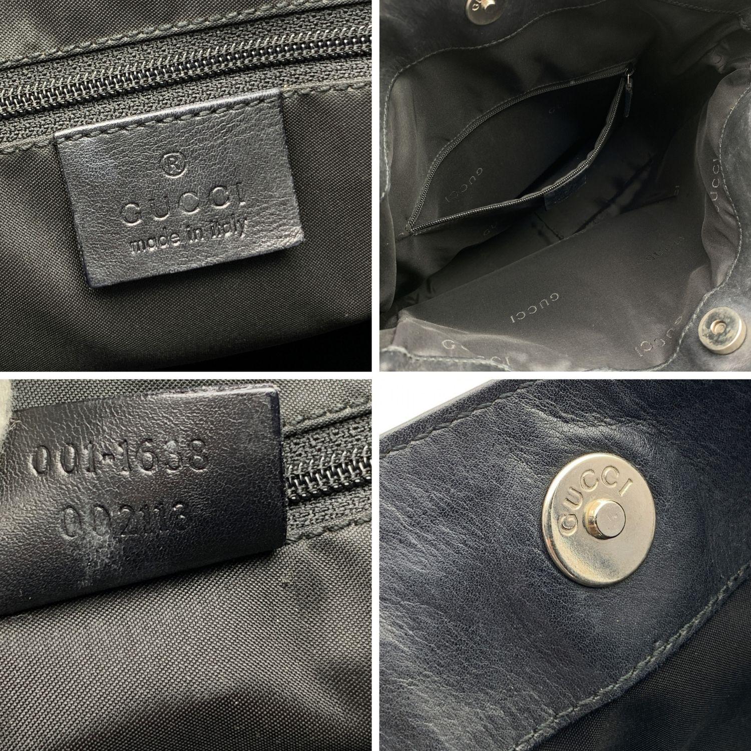 Beautiful Gucci Bamboo tote bag in black leather. Silver metal hardware. Distinctive Bamboo handle. Magnetic button closure on top. Black fabric lining. Zip pocket inside. 'Gucci - Made in Italy' tag inside (serial number on its