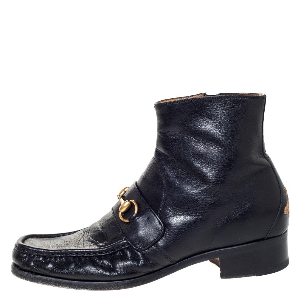 These Gucci ankle boots will elevate your style manifold. Crafted from quality leather, they come in a classic shade of black. They are designed in the likeness of their iconic loafers and modernized with high topline and embroidered bee