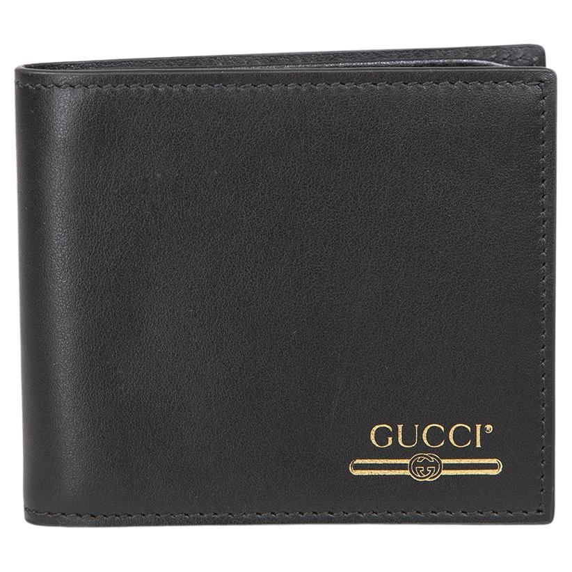 Portafoglio Bifold Logo Stamp di Gucci in pelle nera