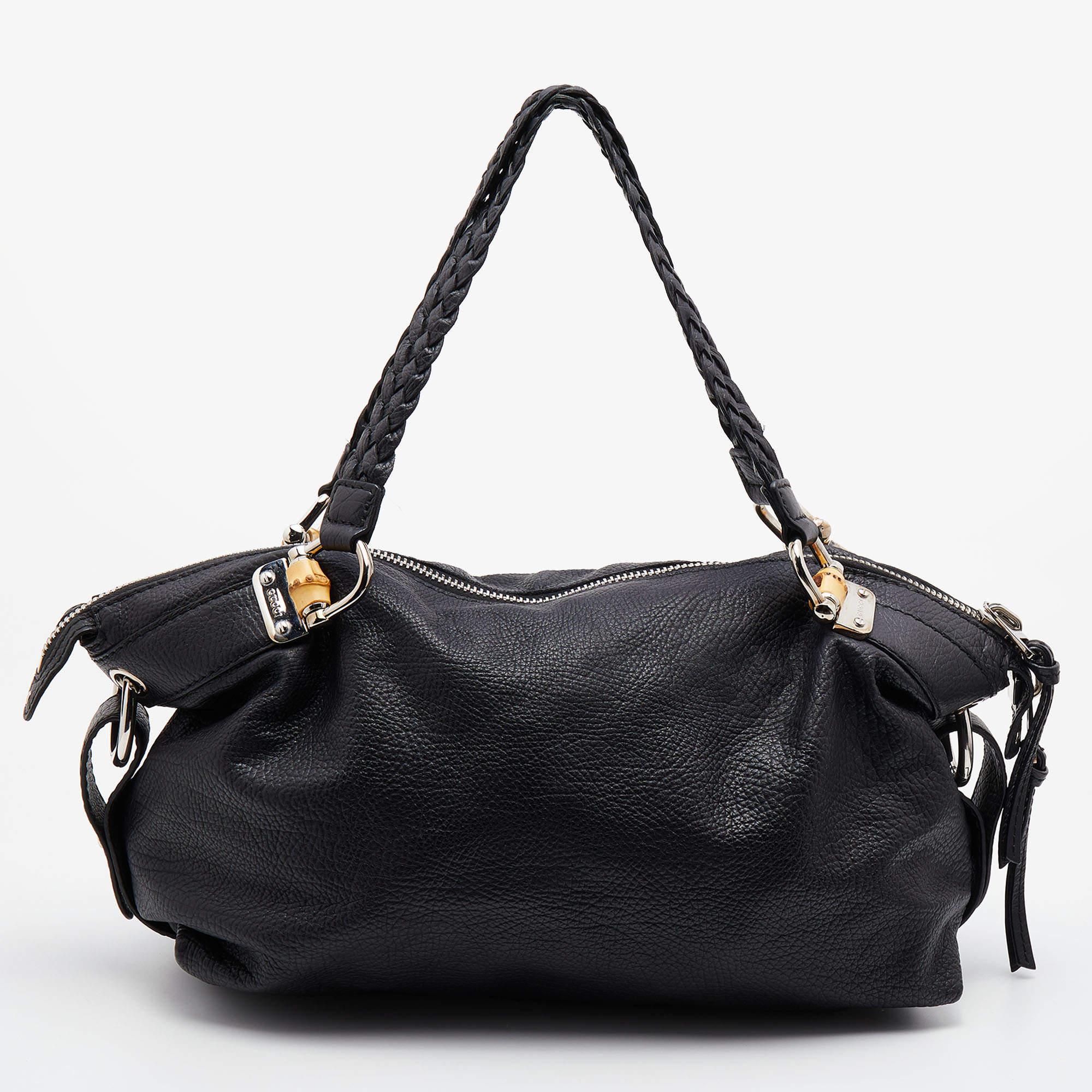 Stylish and easy to carry, this designer satchel will be a fine choice for work or after. Lined well, this pre-loved bag for women can easily fit all your essentials. It can be held in your arm or hand.

Includes: Original Dustbag

