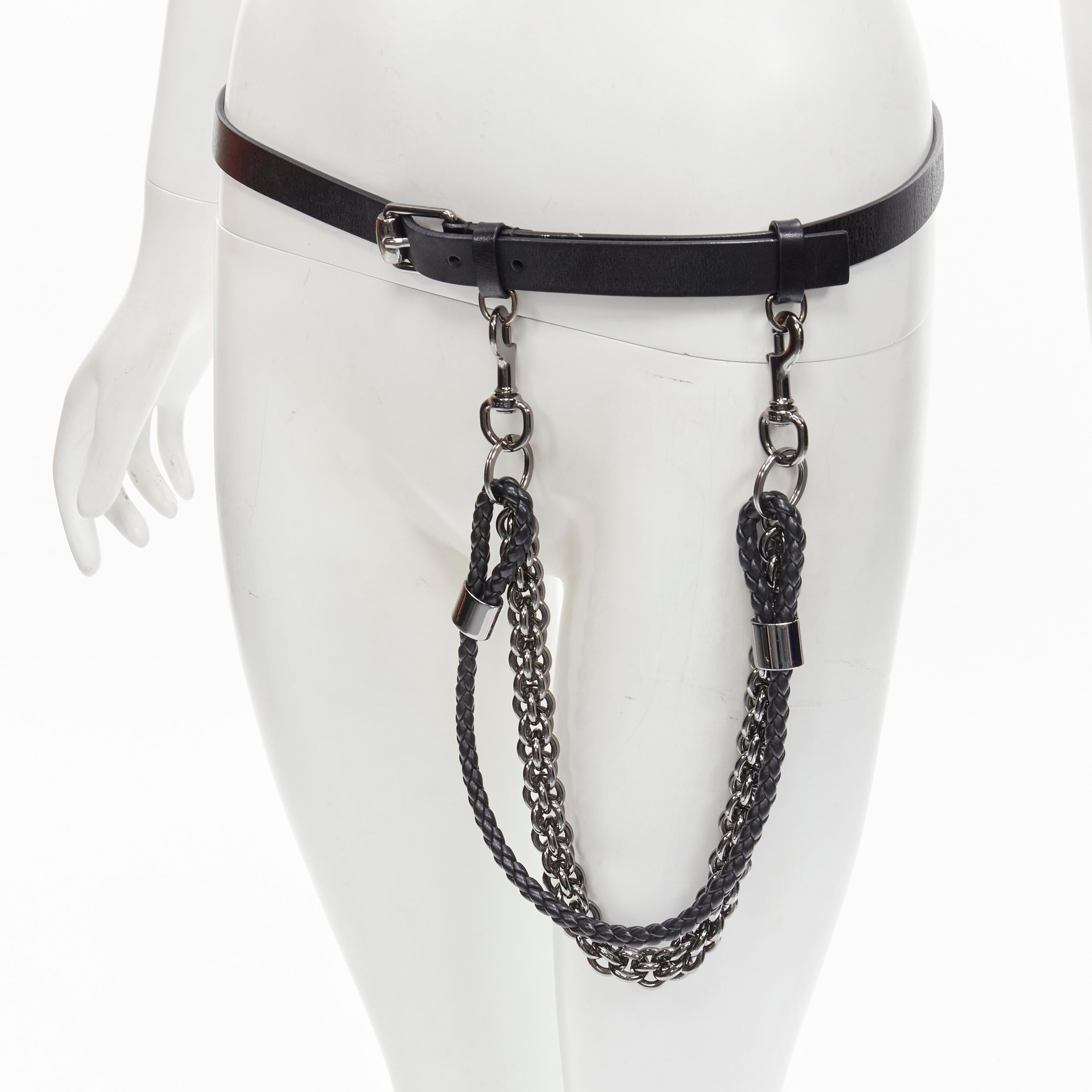 GUCCI black leather braided leather metal link chain skinny belt 85cm
Brand: Gucci
Extra Detail: Black leahter with gunmetal silver hardware. Detachable metal chain and leaded braided strap with lobster clasp lock.

CONDITION:
Condition: Excellent,
