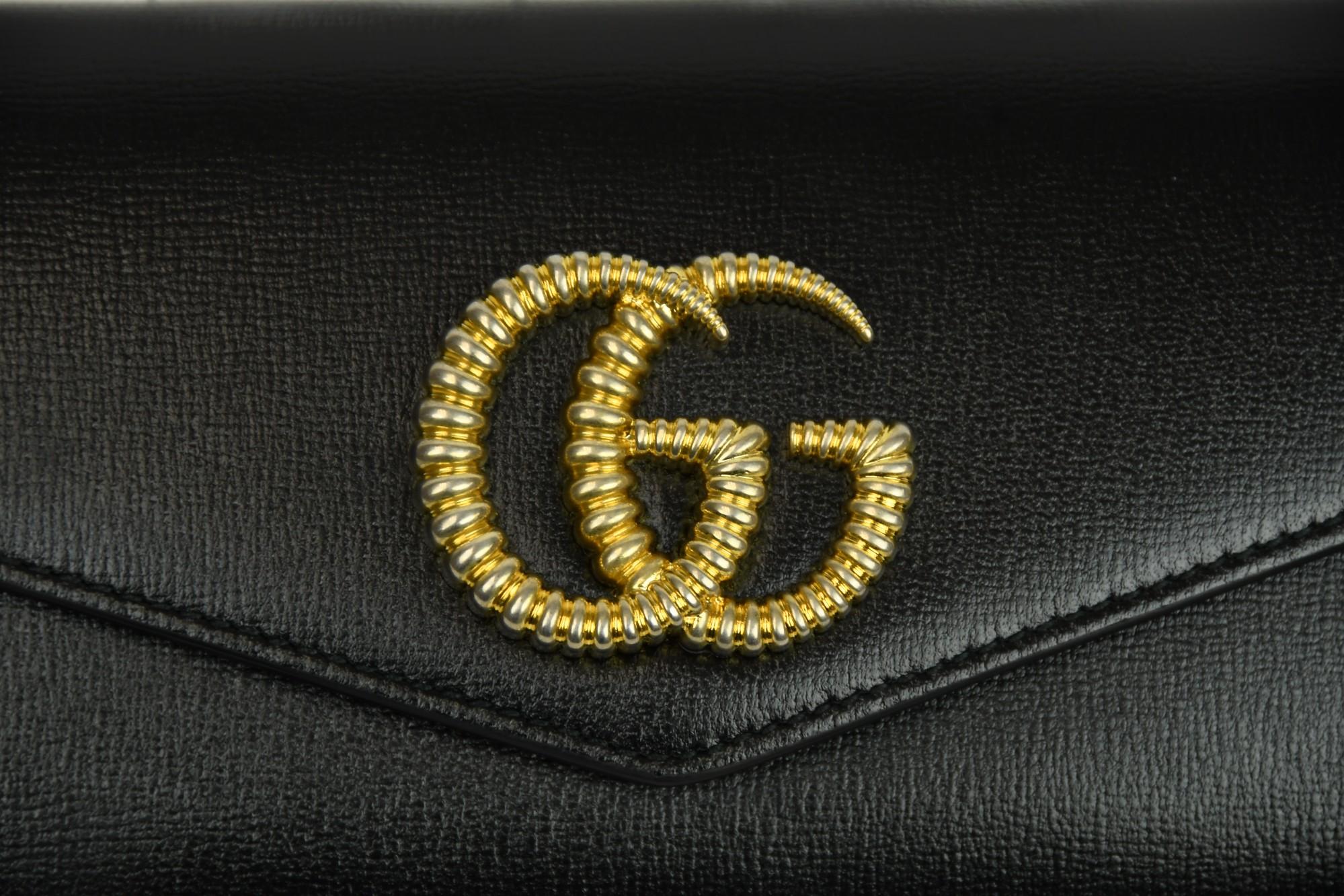 da uomo o donna Gucci Clutch Broadway GG in pelle nera in vendita