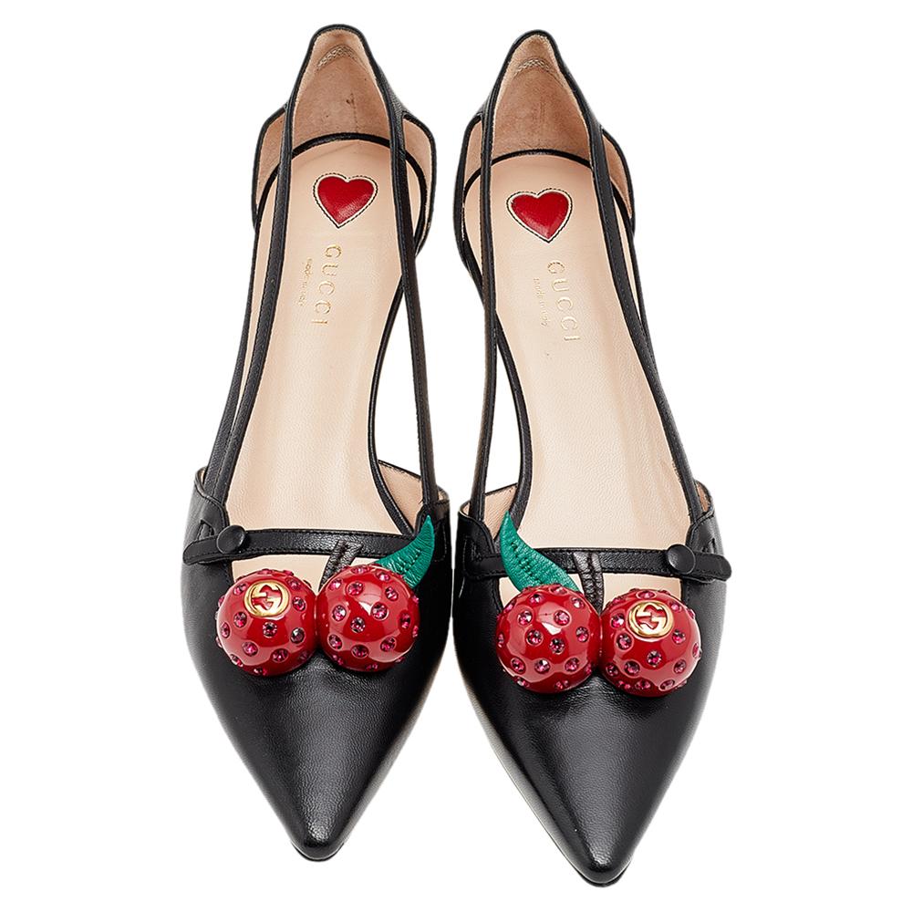 These pointed-toe pumps from Gucci have come straight from a shoe lover's dream. Crafted from black leather, detailed with cherry, and balanced on 5.5 cm bamboo heels, the pumps are lovely and gorgeous!

Includes: Original Box, Original Dustbag,