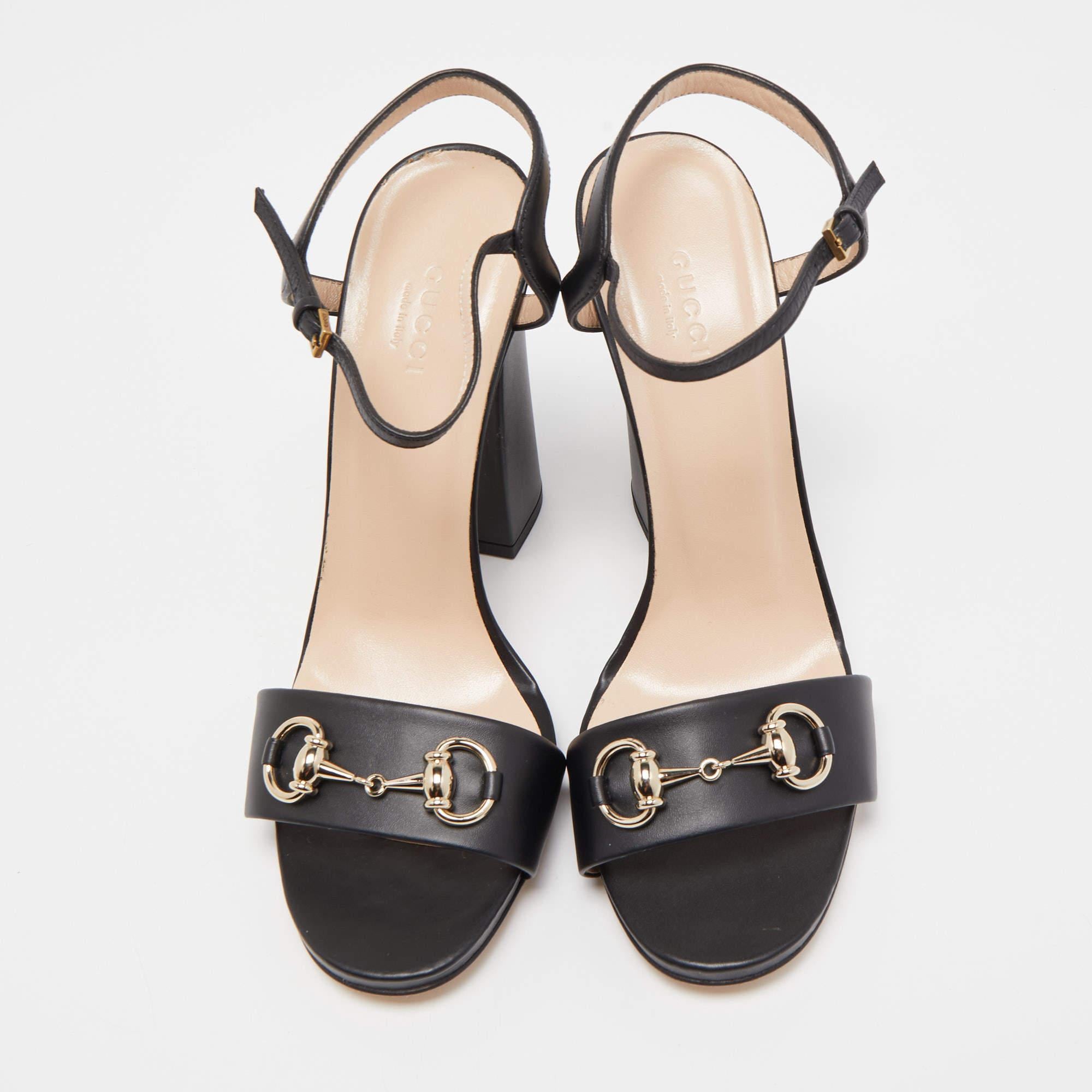 How lovely are these sandals from Gucci! They've been beautifully crafted from leather and styled with Horsebit motifs on the uppers. They carry open-toes, ankle straps and block heels. Let this pair lift your outfits by owning them