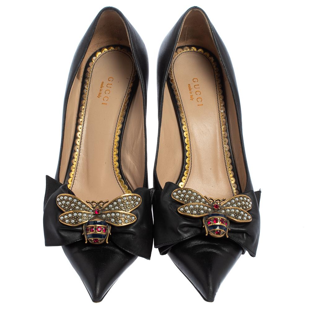 Accessorize with minimal jewelry to keep all eyes on this pair of leather pumps. These Gucci pumps feature pointed toes, the signature embellished bee motifs and bows on the uppers, and 8 cm heels. Don these black beauties and lend a stylish touch