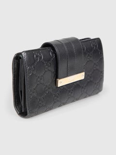 Gucci Black Leather Embossed Monogram Wallet