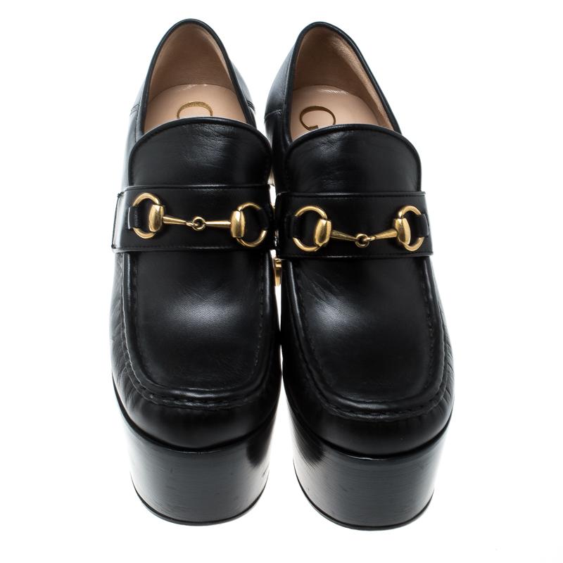 Flaunting a sturdy upper and a cozy footbed, this pair of Vegas pumps by Gucci is perfect for an evening out. Flaunt a stunning look in this pair of shoes, crafted from leather with chunky platforms and pearl-embellished block heels. The insides of
