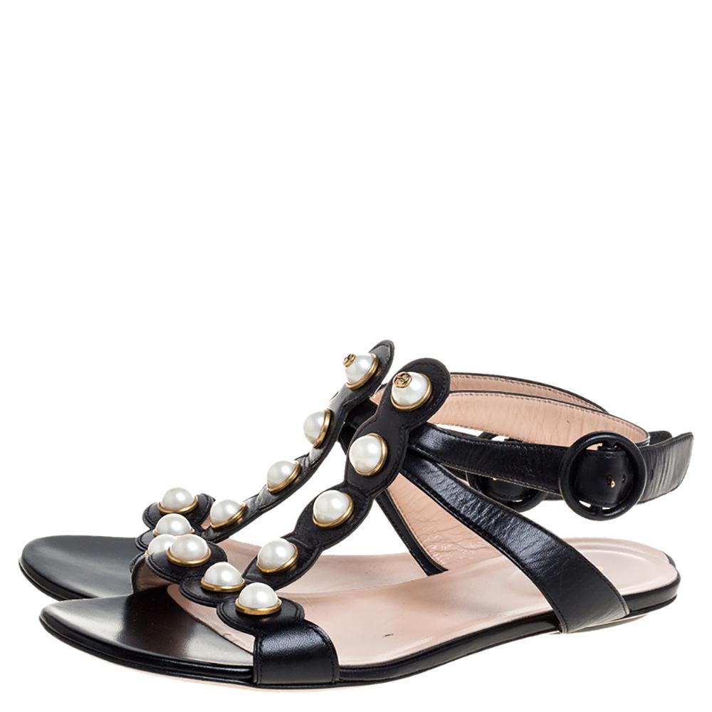 Perfect for channeling an air of elegance, these Willow sandals from Gucci are worth investing in. The black sandals are crafted from leather and feature a T-strap design with faux pearls, buckled ankle straps, comfortable leather-lined insoles, and