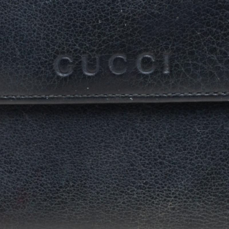 Noir Portefeuille triple en cuir noir de Gucci en vente