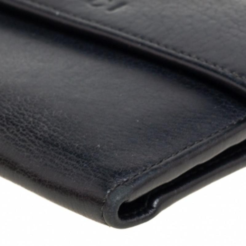 Portefeuille triple en cuir noir de Gucci Bon état - En vente à Dubai, Al Qouz 2