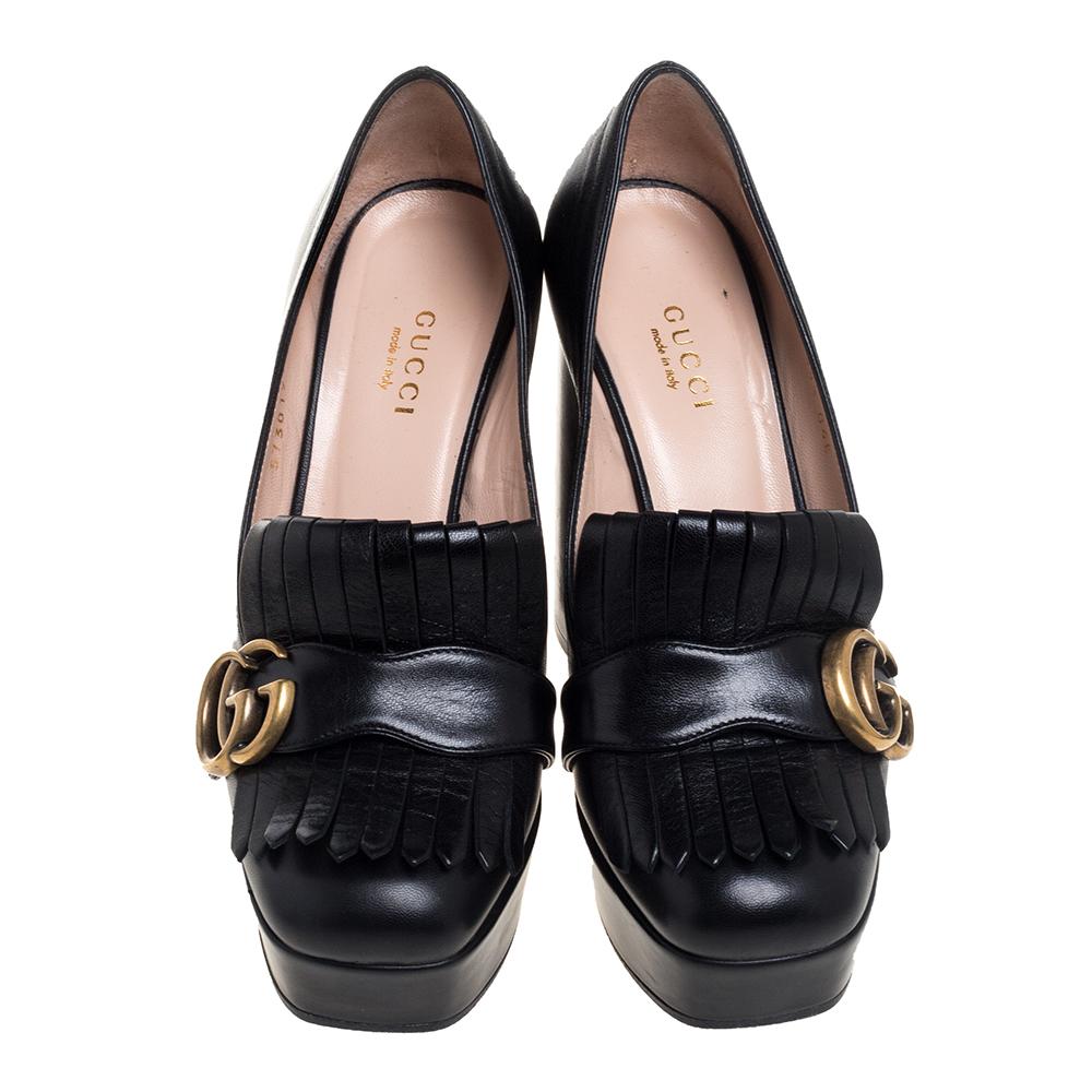 Lending extra character to your looks, these Marmont pumps from Gucci, designed in a loafer style, will certainly appease women with a penchant for unconventional styles. They are rendered in black leather and are decked with fringes and a matching