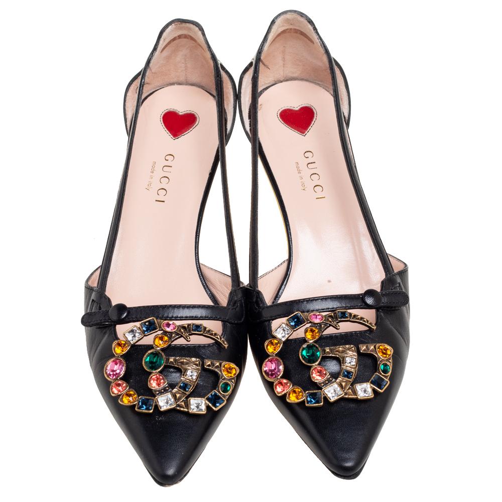 These pointed-toe Gucci pumps have come straight from a shoe lover's dream carry a feminine flair with sleek lines. Crafted from black leather, they are adorned with crystal-embellished GG motifs and low bamboo heels.

Includes: Original Dustbag,