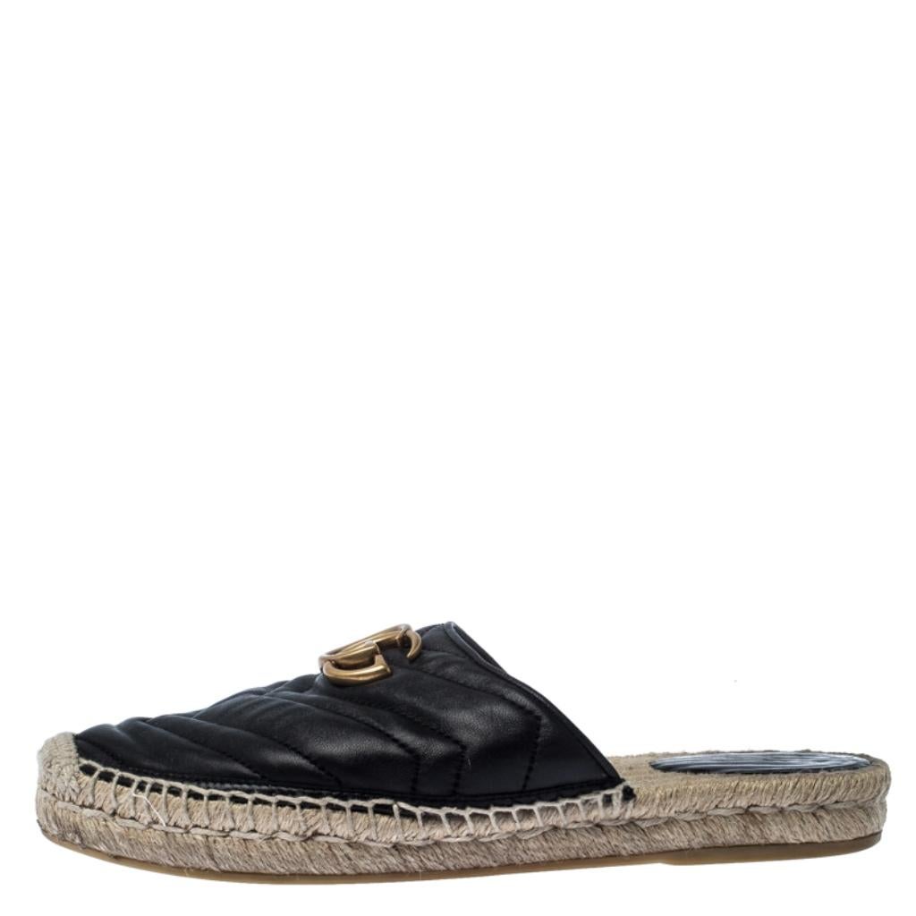 Ditch those aching stilettoes and opt for these chic Gucci flats for a change. It features black leather-covered toes and espadrille soles. The flats are detailed with chevron quilting and the GG logo. Easy to slip on and off, this pair is a