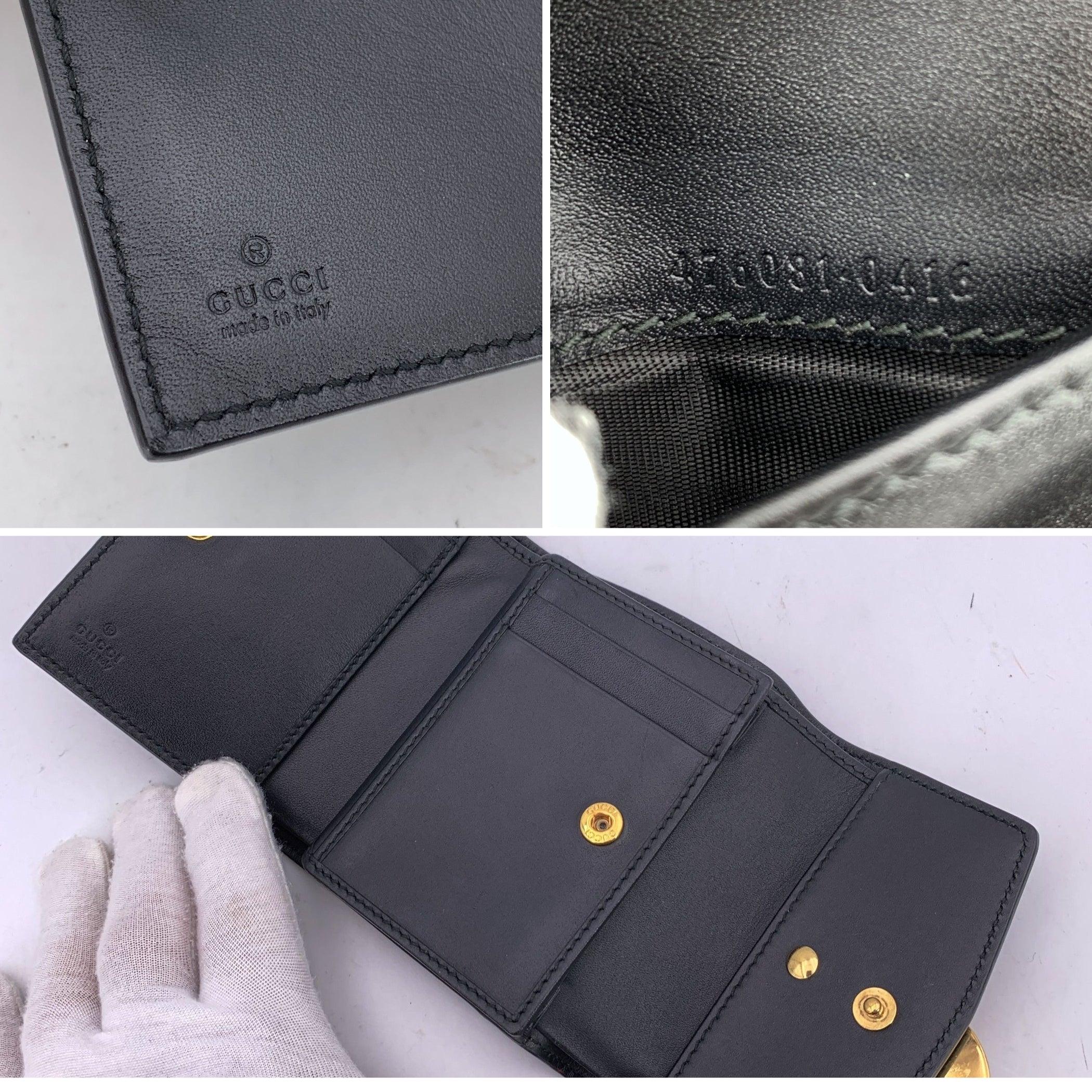 Donna Portafoglio compatto GG in pelle nera di Gucci in vendita