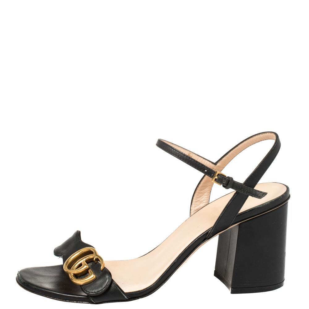 Comfortable and stylish at the same time, these Marmont sandals from Gucci are simply amazing! They are crafted from leather and styled in an open toe silhouette with the signature GG logo detailed vamp straps. They are endowed with comfortable
