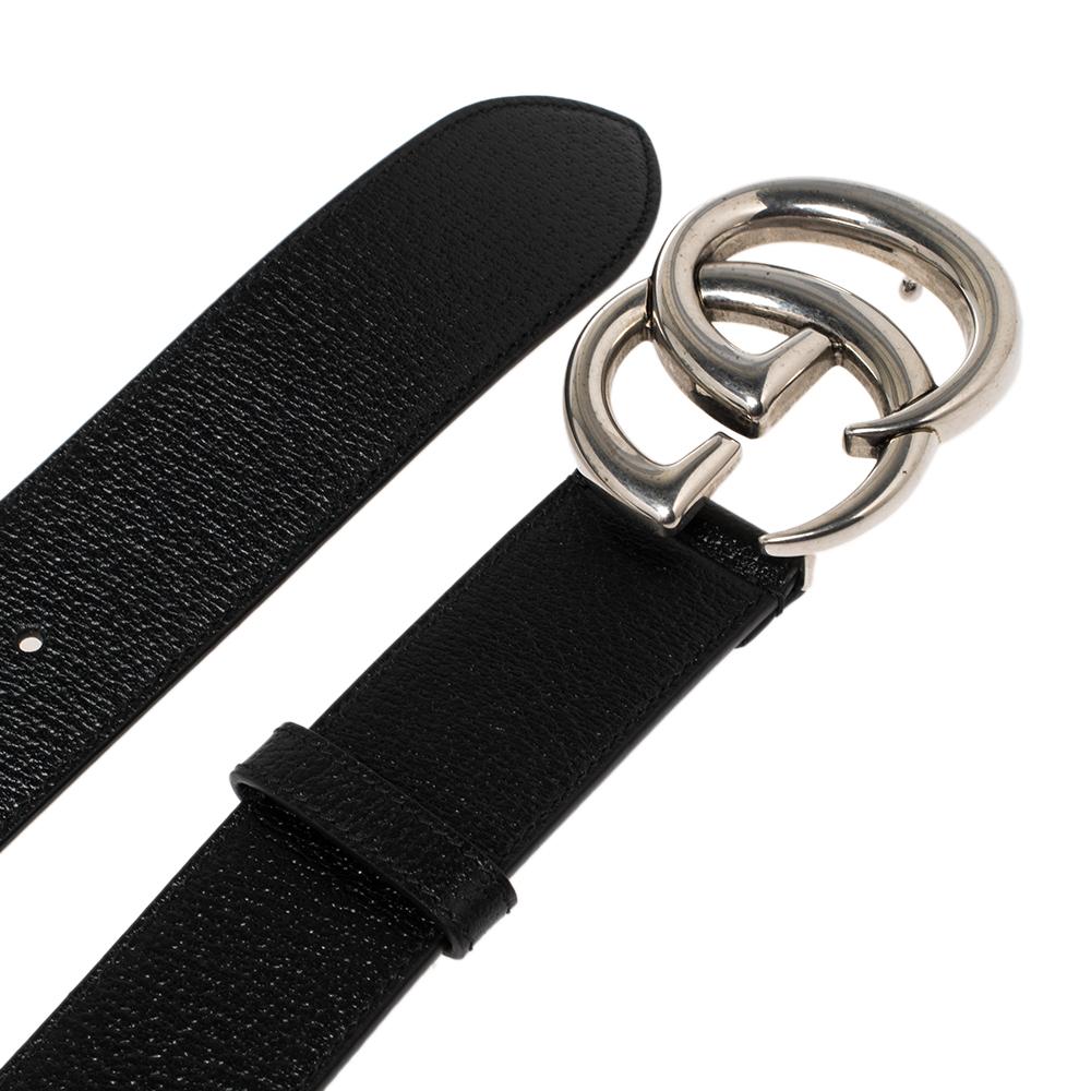 The GG Marmont belt by Gucci is made in Italy from black leather keeping everyday styling in mind. It's designed with tonal stitches and finished with the House's GG buckle in silver-tone hardware.

Includes: Original Box, Original Dustbag