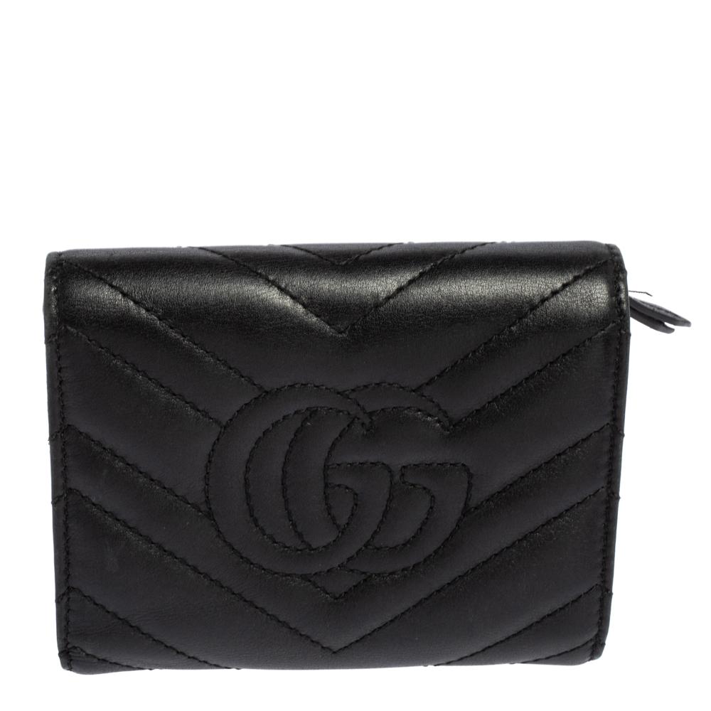 From the House of Gucci, here is an impressionable style you won't forget. The GG Marmont wallet is a highly-functional, super-stylish accessory. It has been crafted using black leather on the exterior with a gold-toned GG motif attached to the