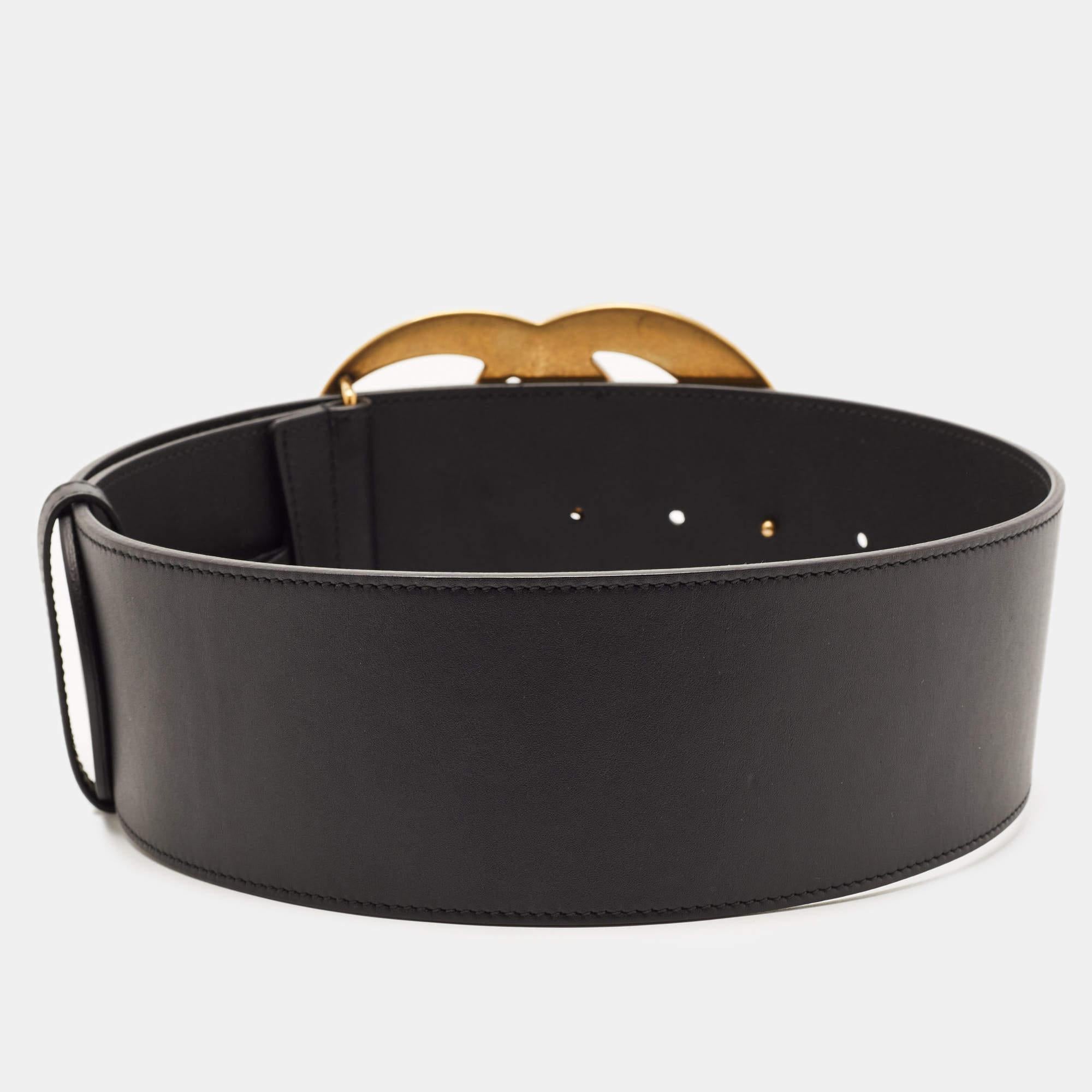 The GG Marmont belt from Gucci has found a fan in women around the globe and it's time you get one for yourself too! This chic belt comes crafted from leather and features the iconic GG buckle in gold-tone metal. It is sure to lend your dresses,