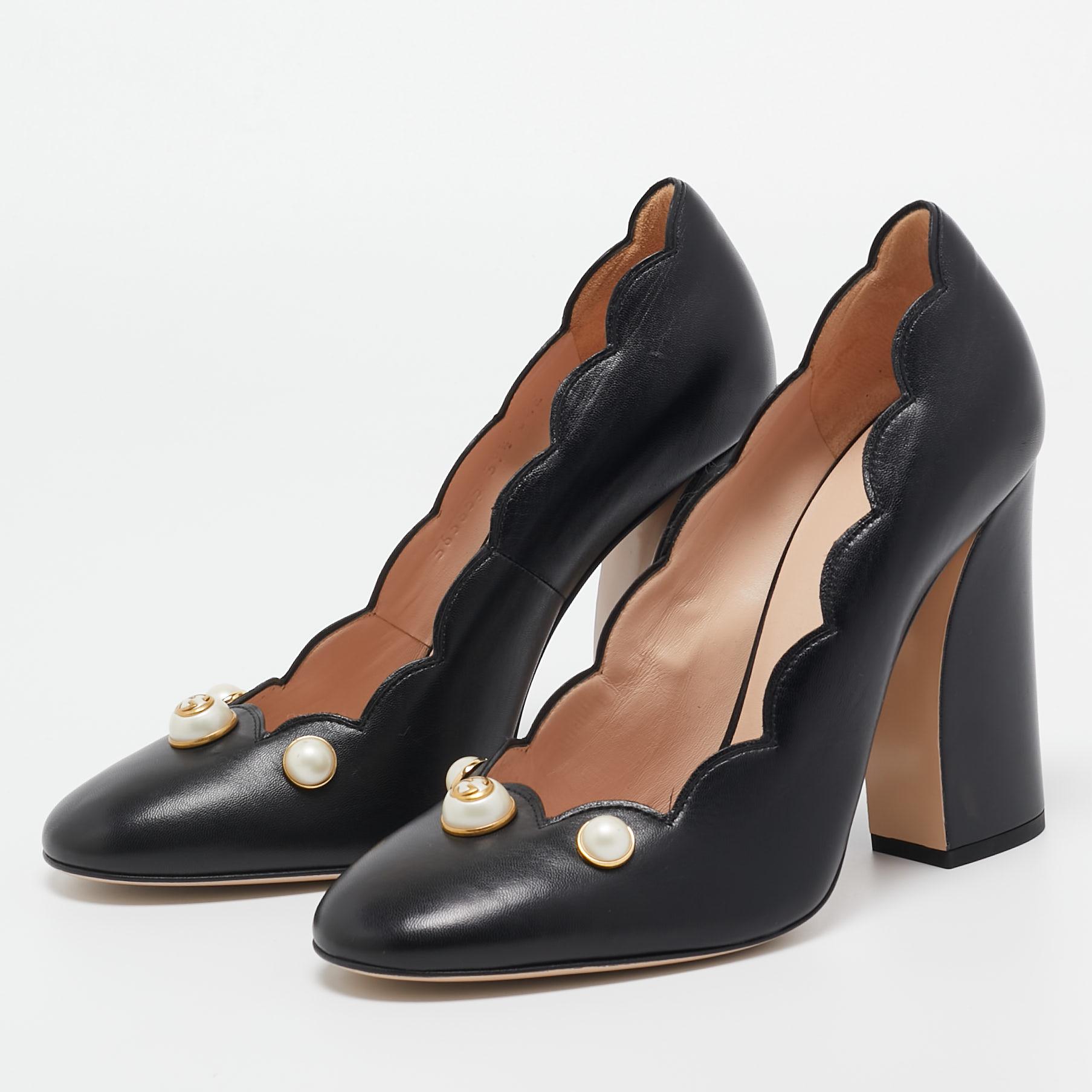 Exhibit an elegant style with this pair of pumps. These designer pumps are crafted from quality materials. They are set on durable soles and block heels.

