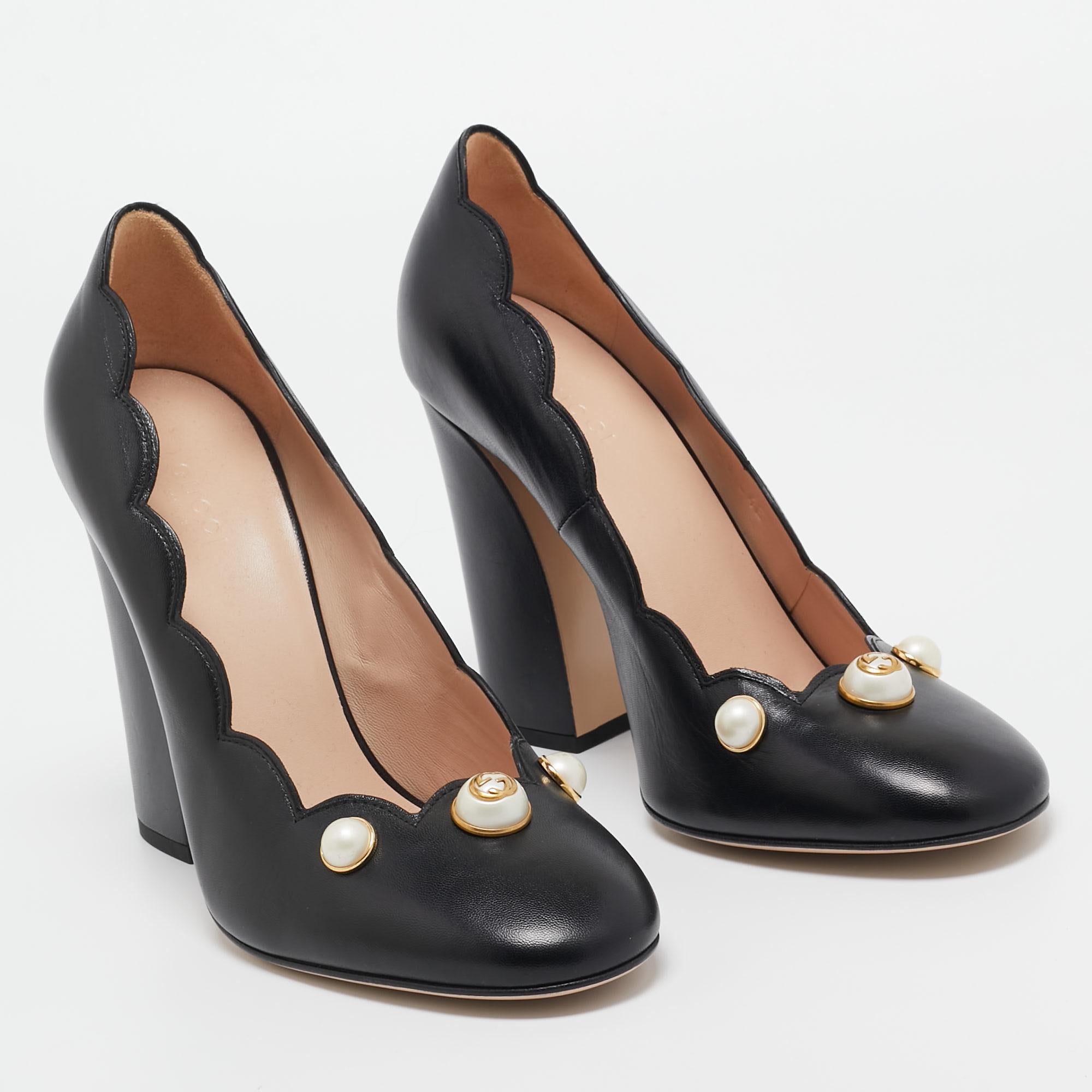 Exhibit an elegant style with this pair of pumps. These designer pumps are crafted from quality materials. They are set on durable soles and block heels.

