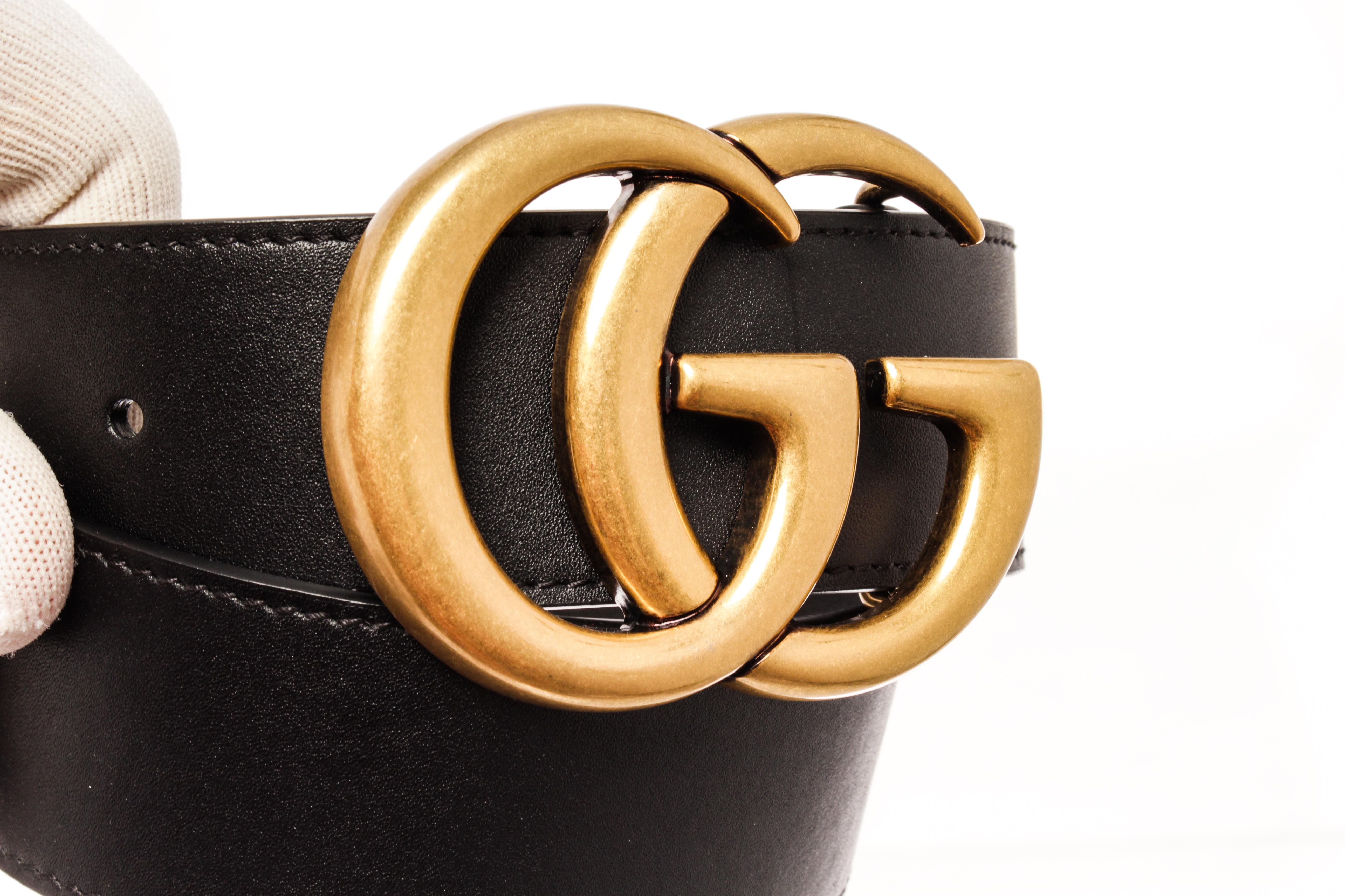 Gucci Black Leather Gold Wide Double GG Logo Belt 70 with material leather, gold-tone hardware and turn-lock closure, with double gg logo.

440309MSC