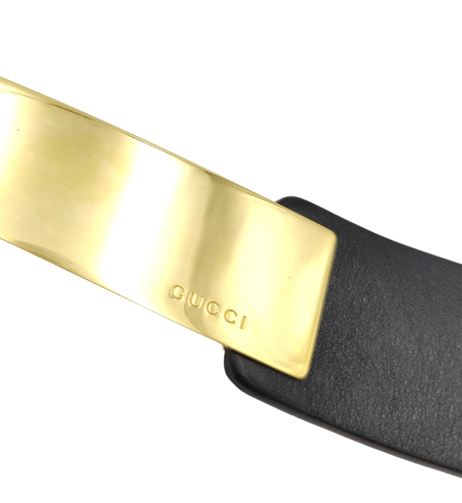 Gucci black leather golden metal engraved logo belt In Good Condition For Sale In Milano, IT