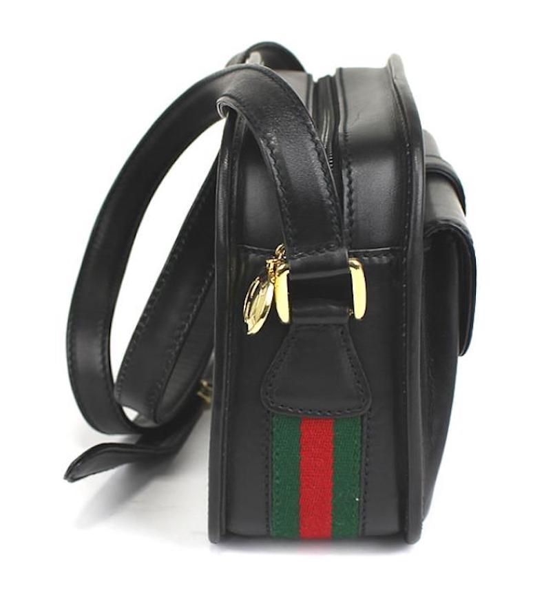 Gucci Black Leather Green Red Signature Strip Camera Crossbody Shoulder Flap Bag

Leather
Fabric
Gold tone hardware
Woven lining
Made in Italy
Measures 8.25