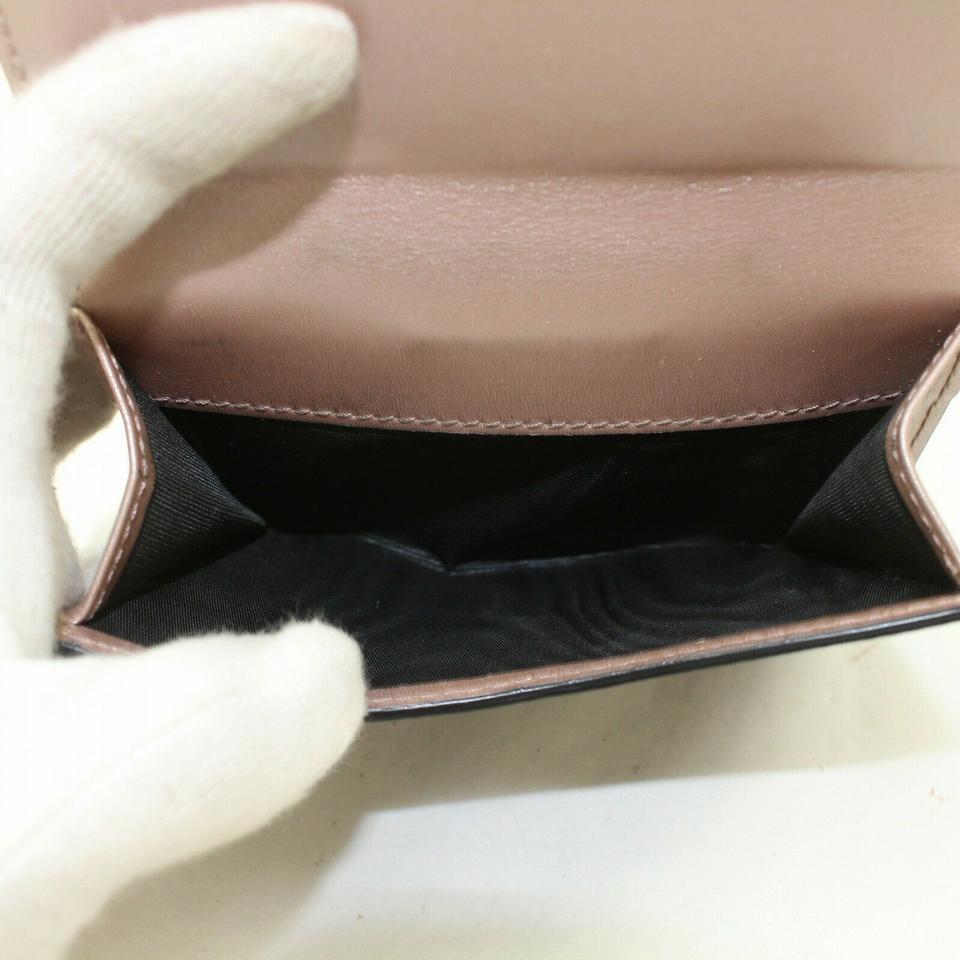 Portefeuille compact 871279 Gucci en cuir noir avec logo en forme de cœur en vente 6