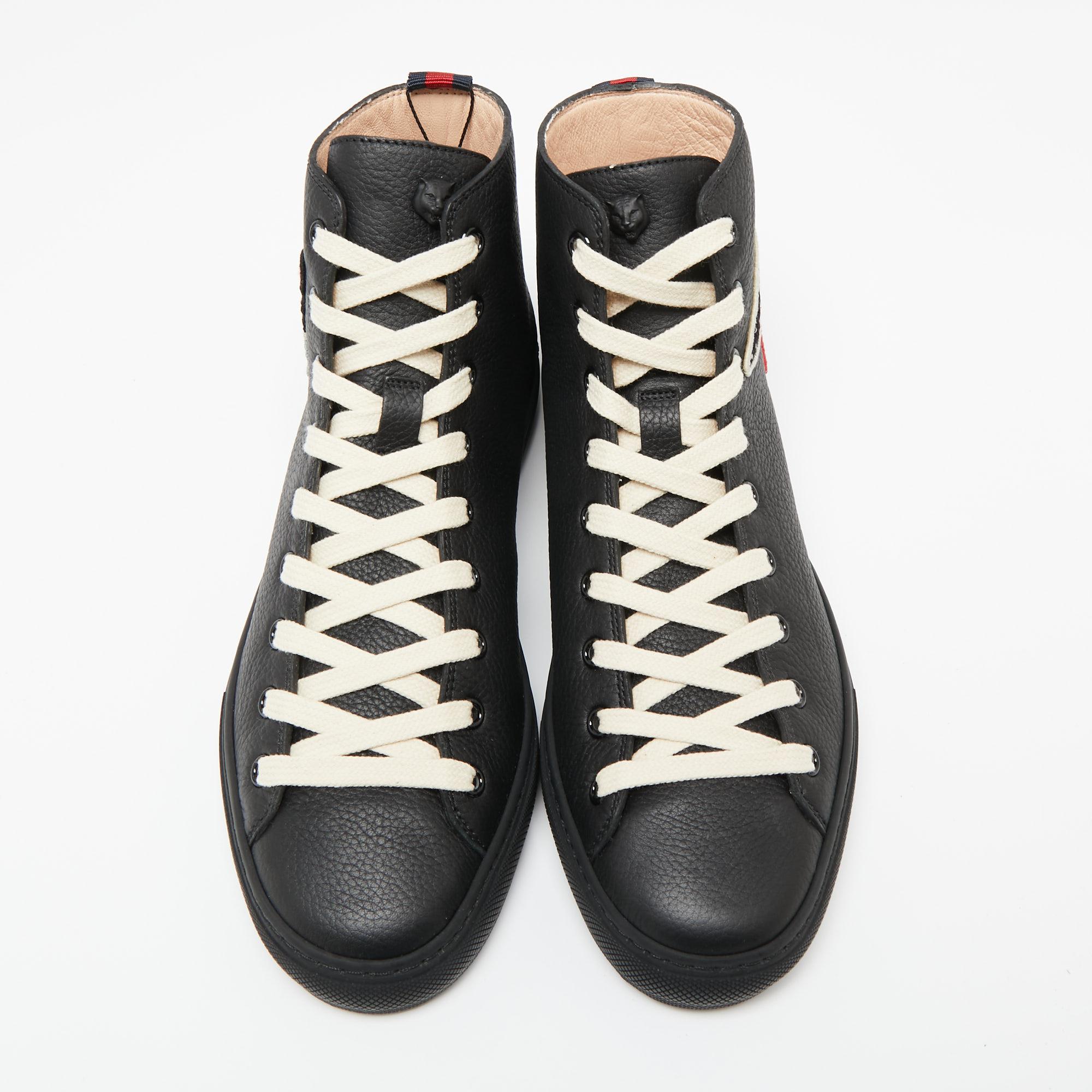 This pair of black Gucci sneakers are crafted from leather featuring different patches on the sides and signature Web details on the counters. They come with lace-up vamps and leather-lined insoles for added comfort. Team them with jeans and a