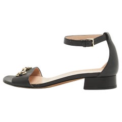 Gucci Horsebit-Sandalen aus schwarzem Leder mit Knöchelriemen Größe 37