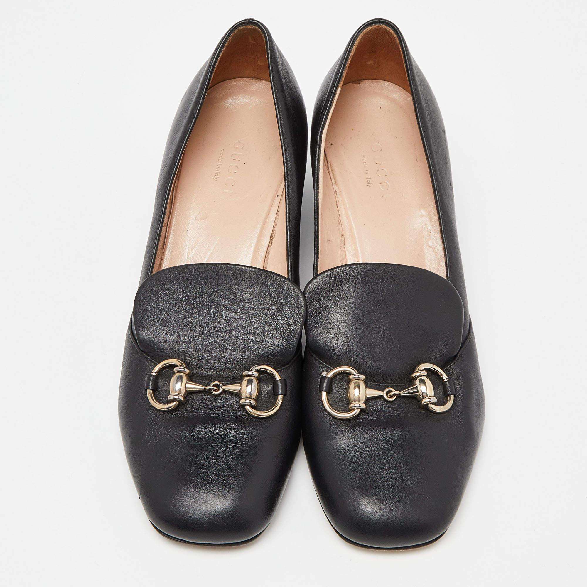 Finesse and poise will all come naturally to you when you step out in this pair of Horsebit pumps from Gucci. Crafted from leather, the black pumps have been styled with square toes, block heels and the iconic Horsebit detail on the uppers. The