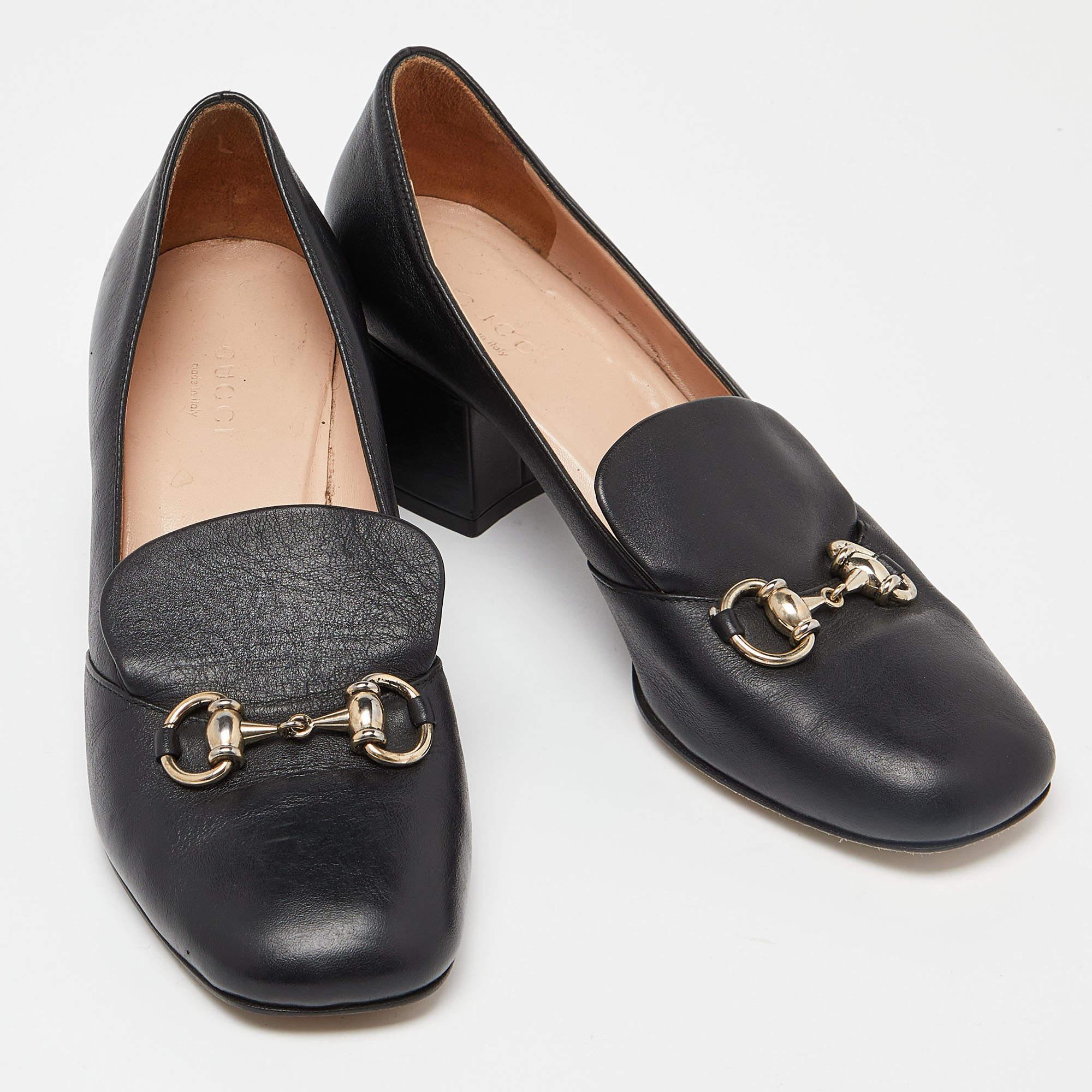 Finesse and poise will all come naturally to you when you step out in this pair of Horsebit pumps from Gucci. Crafted from leather, the black pumps have been styled with square toes, block heels and the iconic Horsebit detail on the uppers. The