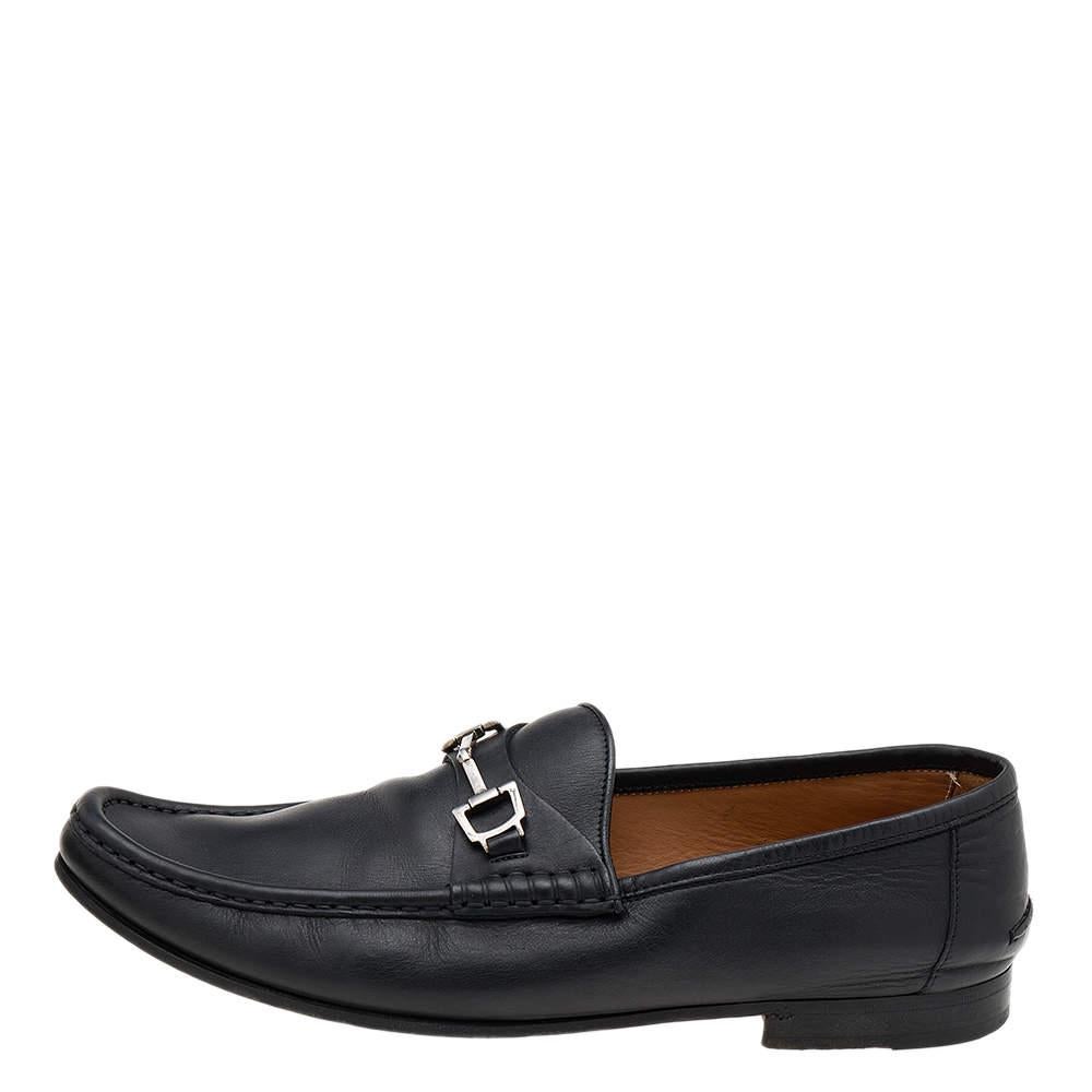 Let comfort and classic style be yours with these designer loafers from Gucci. Crafted in black leather, the high-quality shoes have the perfect construction to take you through the day with utmost ease.

