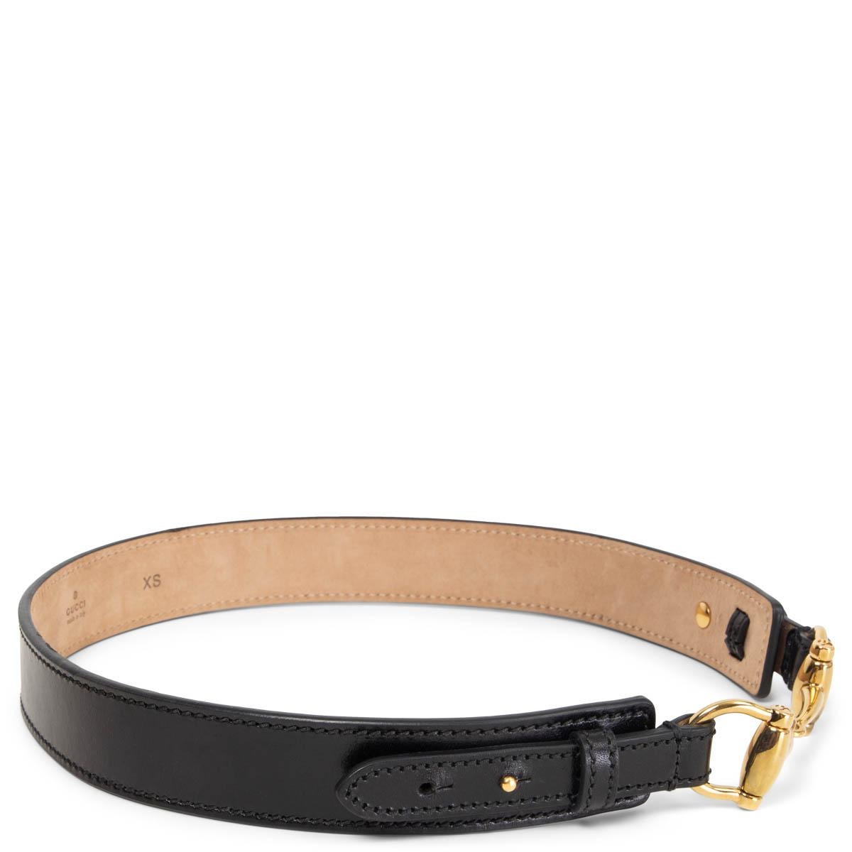 100% authentic Gucci horse-bit waist belt in black calfskin featuring gold-tone metal horse-bit in the middle. Has been worn and is in excellent condition. 

Tag Size	XS
Width	3cm (1.2in)
Fits	62cm (24.2in) to 70cm (27.3in)
Length	79cm