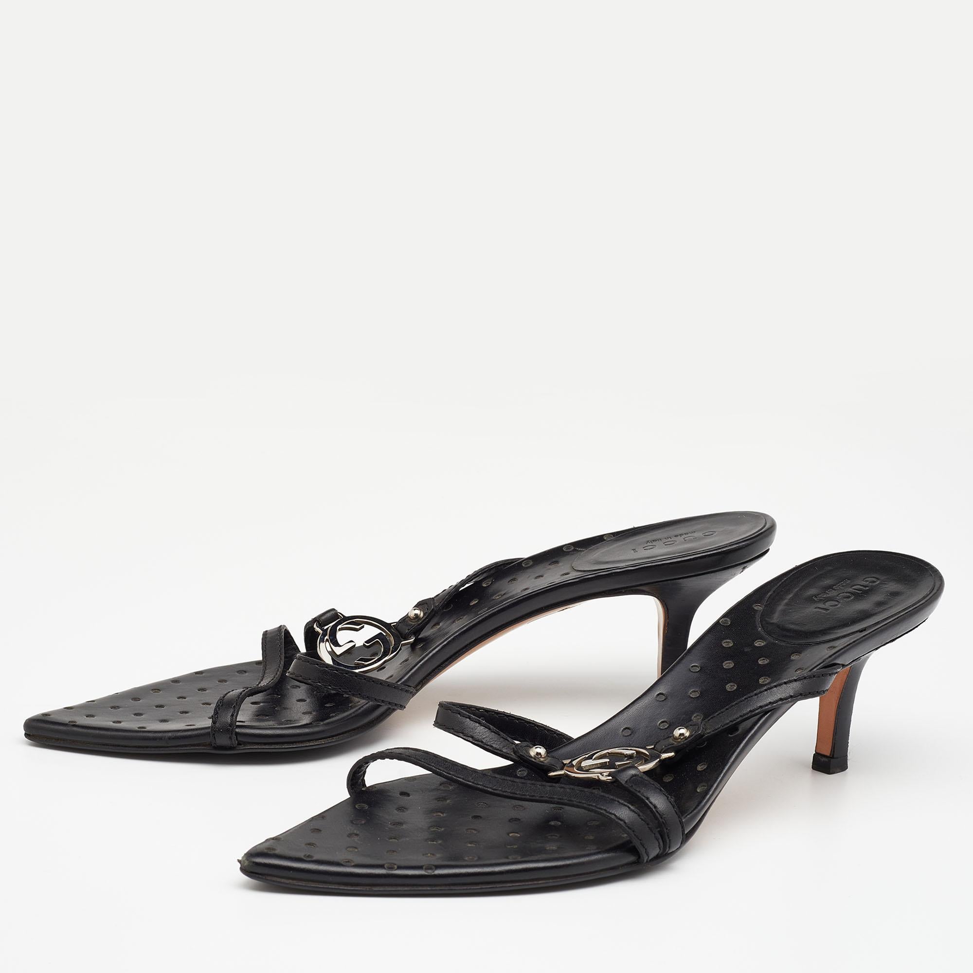 Complete your outfits with these beautiful Gucci sandals for women that are easy to wear and effortlessly stylish. Constructed in leather, these slides feature thin straps and the famous interlocking G logo for a signature look.

Includes: Original