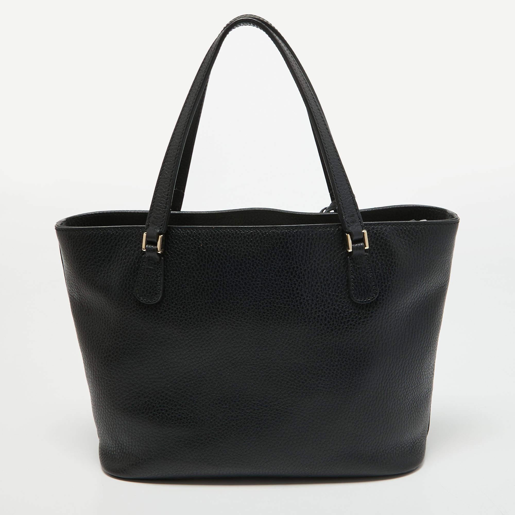 Thoughtful details, high quality, and everyday convenience mark this designer bag for women by Gucci. The bag is sewn with skill to deliver a refined look and an impeccable finish.

Includes: Branded Dustbag

 