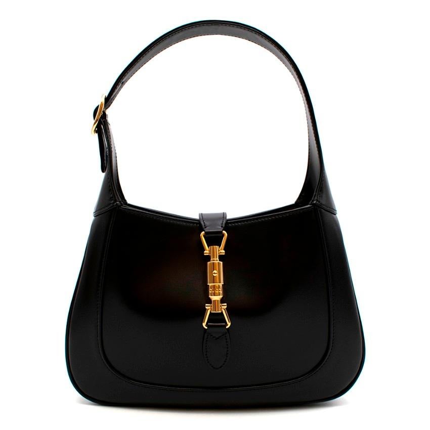 Gucci Black Jackie 1961 Small Hobo Bag

The reintroduction of the Iconic Jackie bag; enhanced with an additional, detachable shoulder strap. Attached to the bag with a buckle closure, the second strap adds a contemporary feel to the archival style,