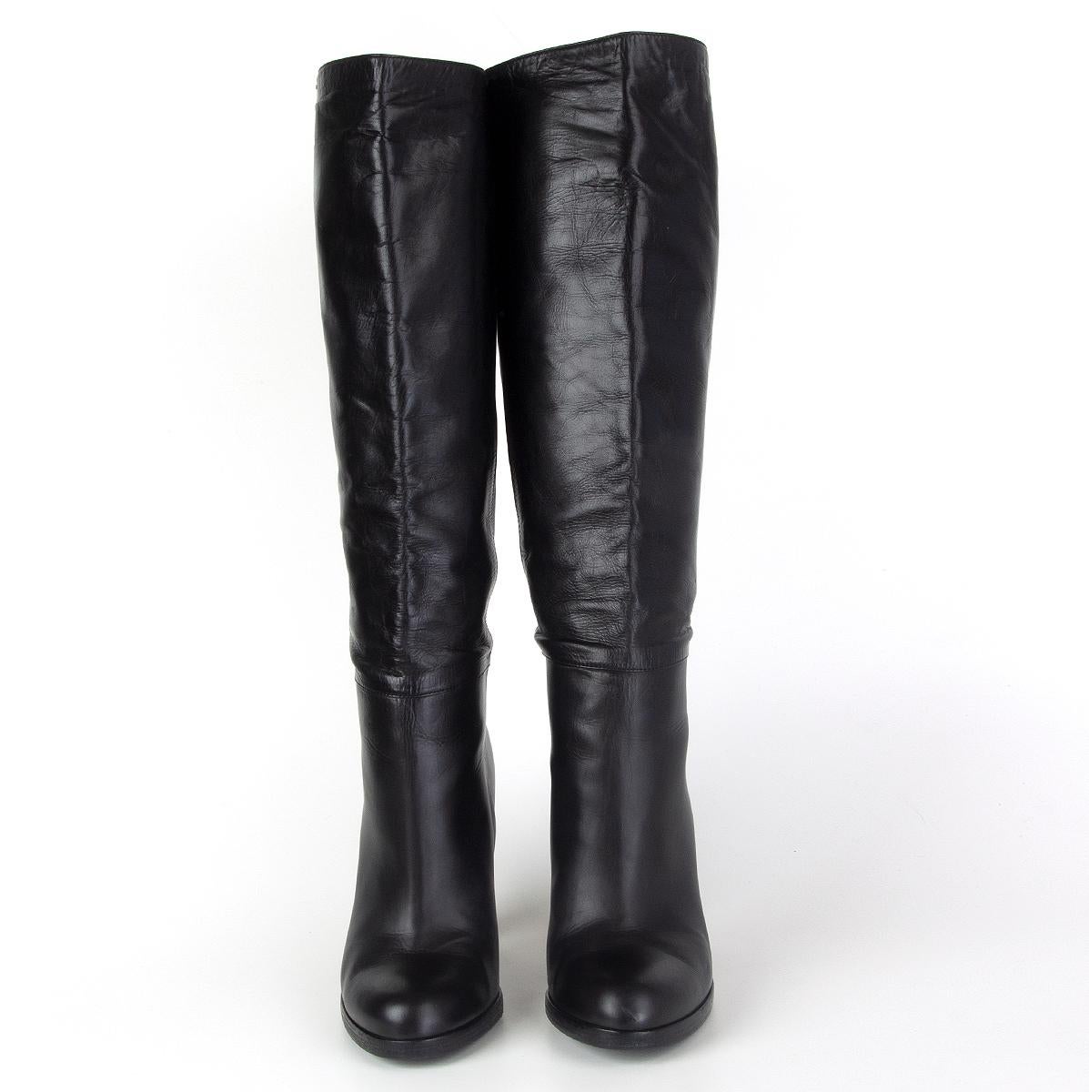 100% authentic Gucci round-toe knee-high boots in black calfskin and Gucci logo on heel. Have been worn and are in excellent condition. Rubber sole has been added. Come with dust bag. 

Measurements
Imprinted Size	35
Shoe Size	35
Inside Sole	22.5cm